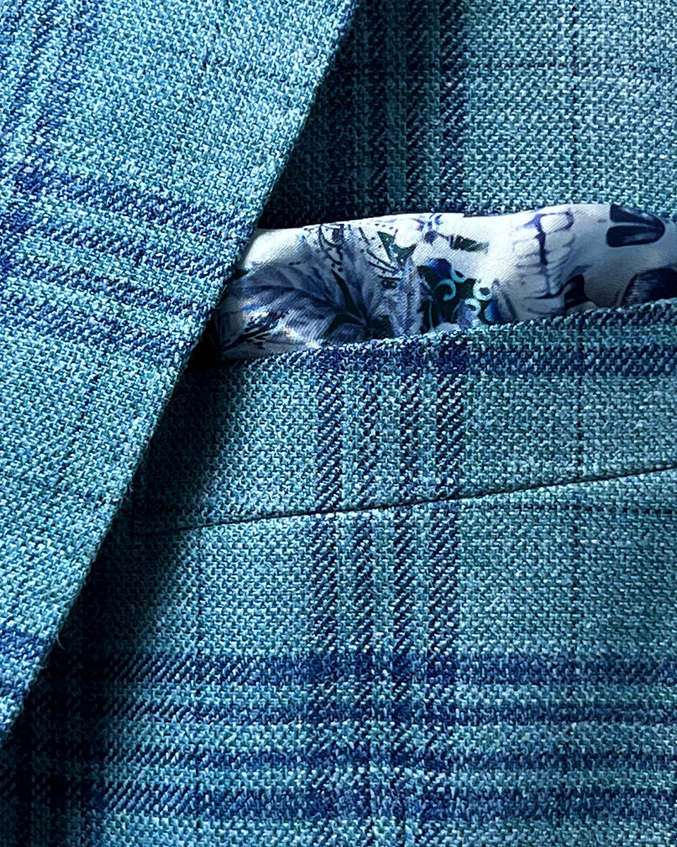 View of the men's sportcoat's built-in pocket square in skull blue lining.