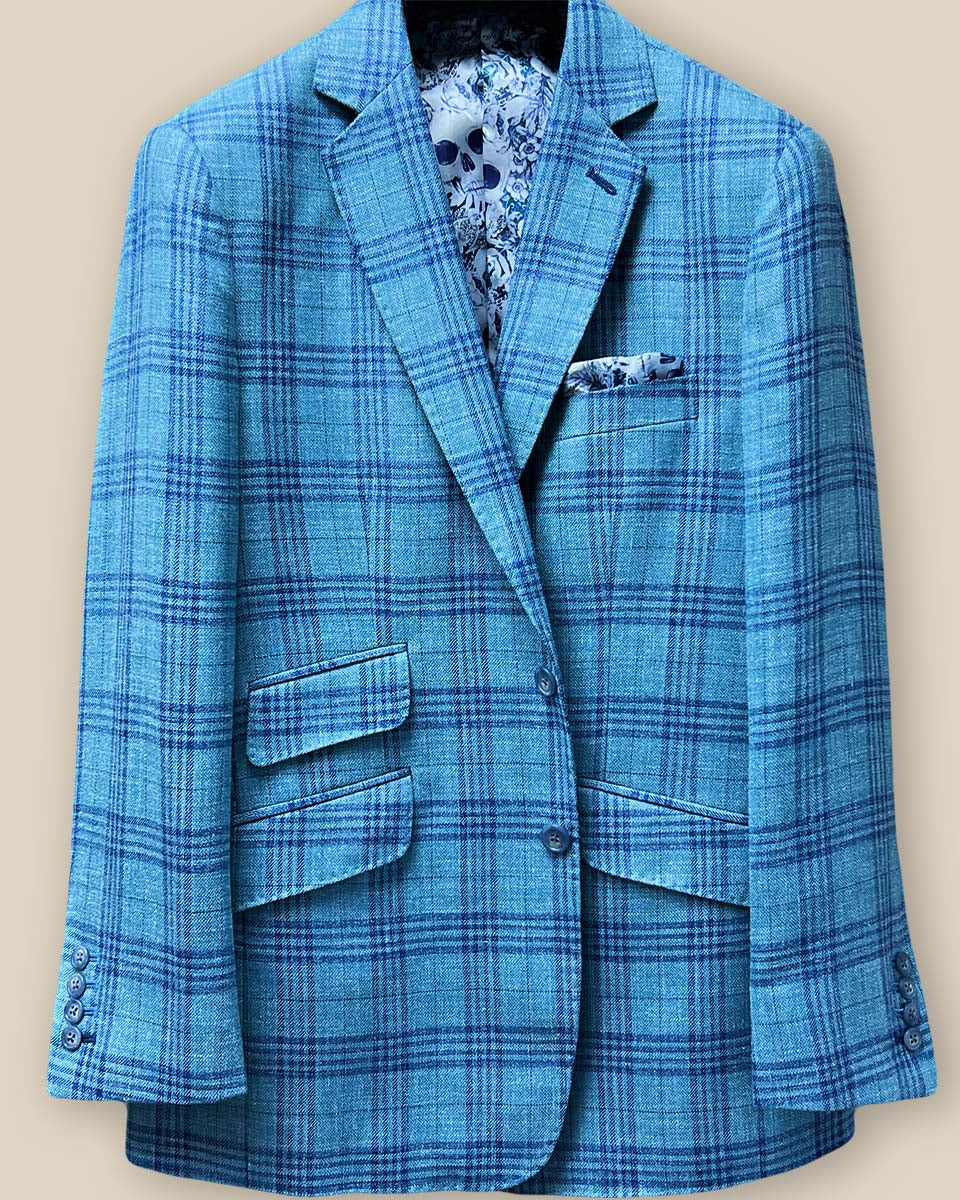 Detailed view of the men's sportcoat's button panel with turquoise marble horn buttons.