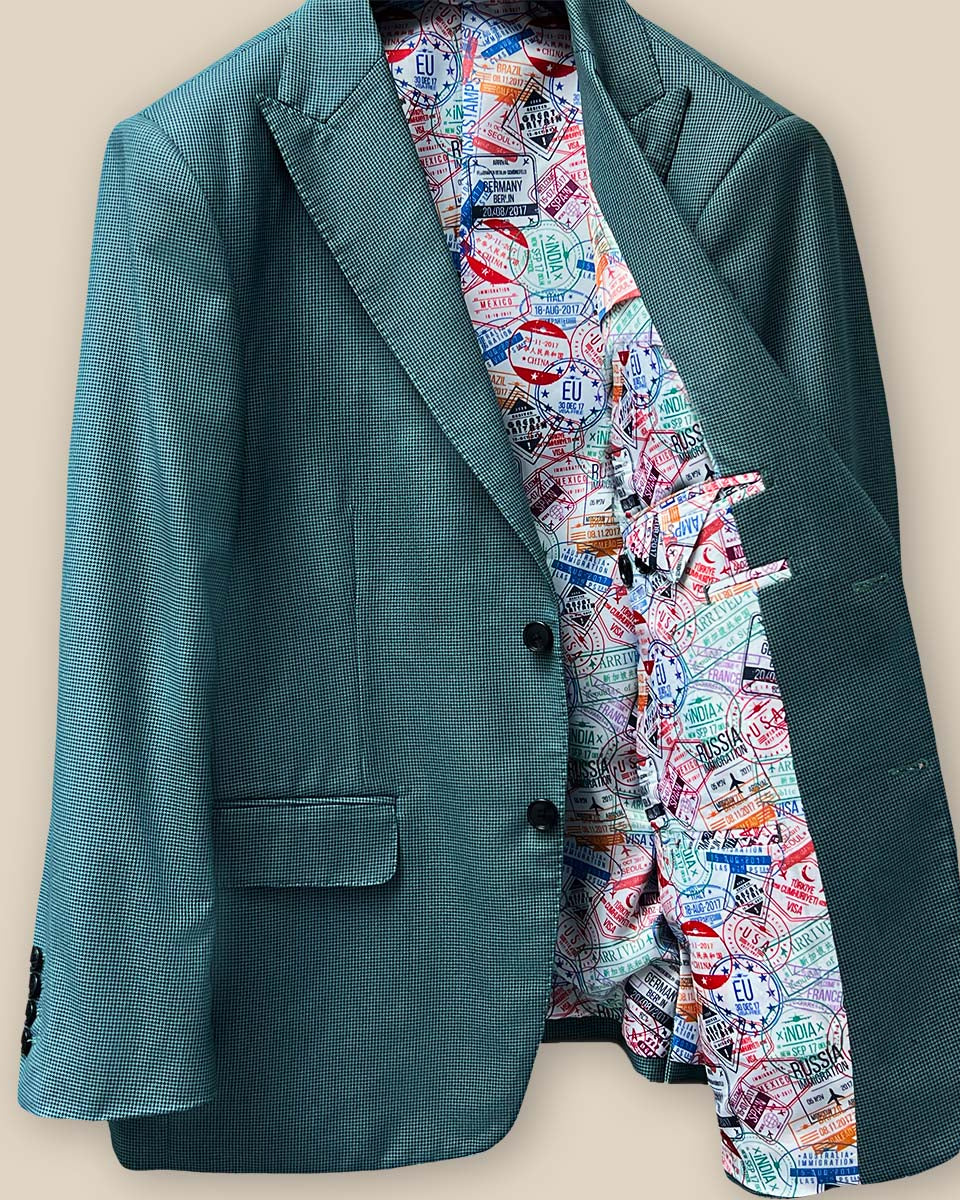 Elegant horn buttons on a hunter green sportcoat.