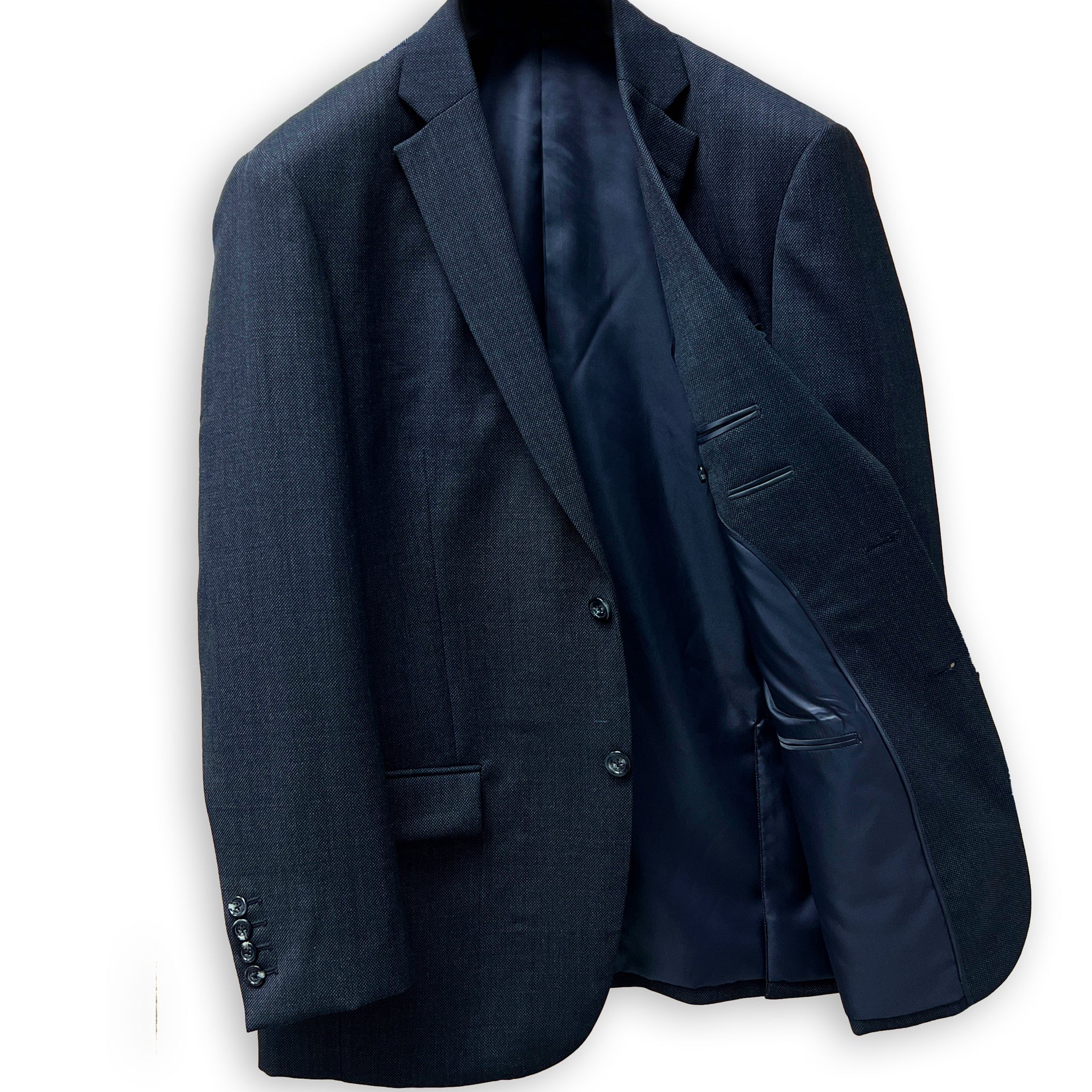 Dark grey birdseye men's suit, rear view showcasing custom tailoring and online suit design