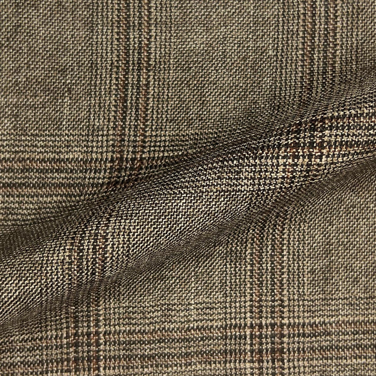 Westwood Hart custom tailored men's bamboo suit in steel brown with rust windowpane design.