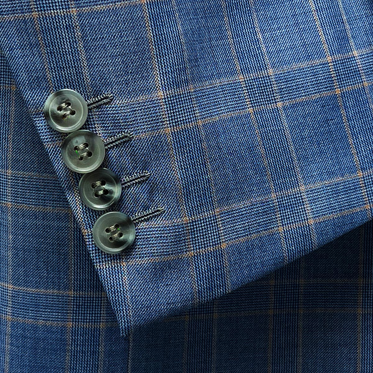 Close-up of 100% Australian Merino Wool fabric in a business suit.