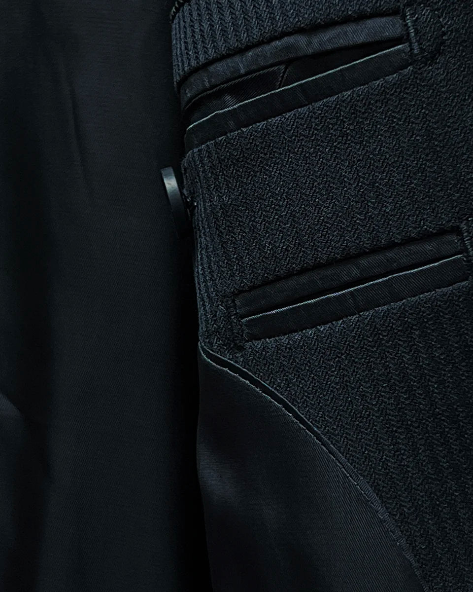 Detailed view of the black Bemberg lining inside the jacket, illustrating its quality and texture.
