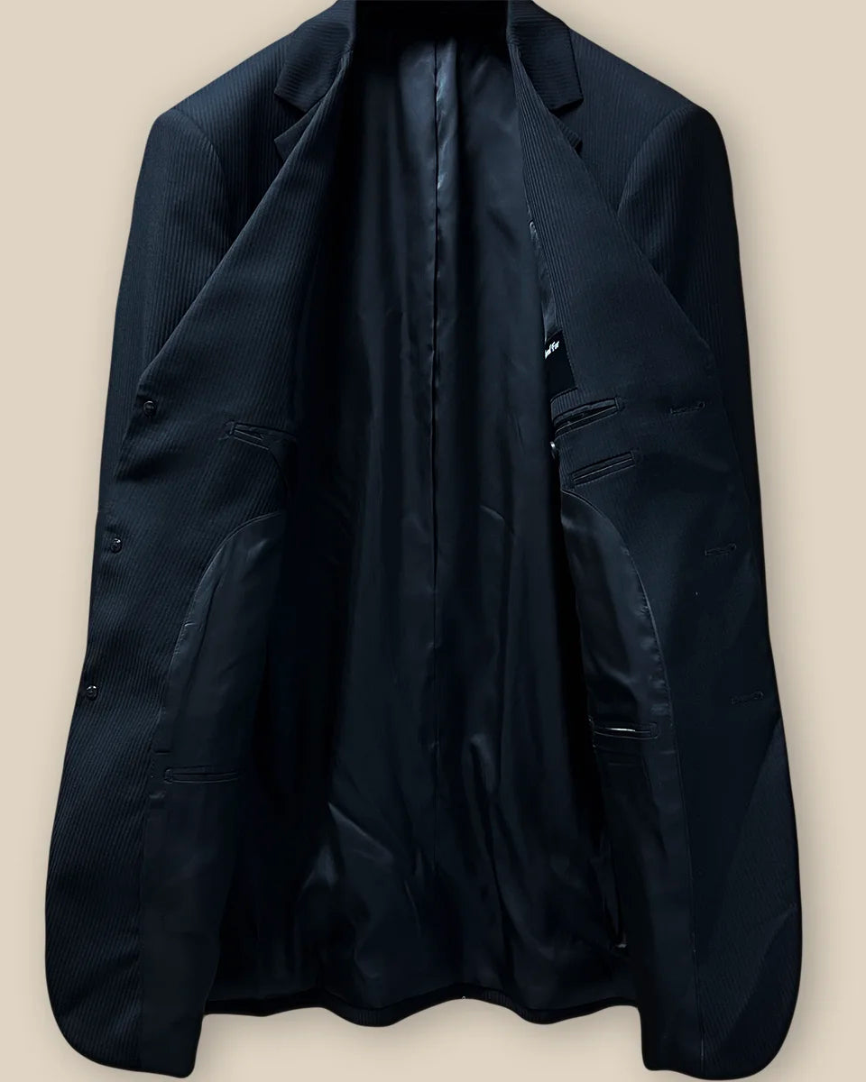 Interior view of the jacket, highlighting the luxurious black Bemberg lining and craftsmanship.