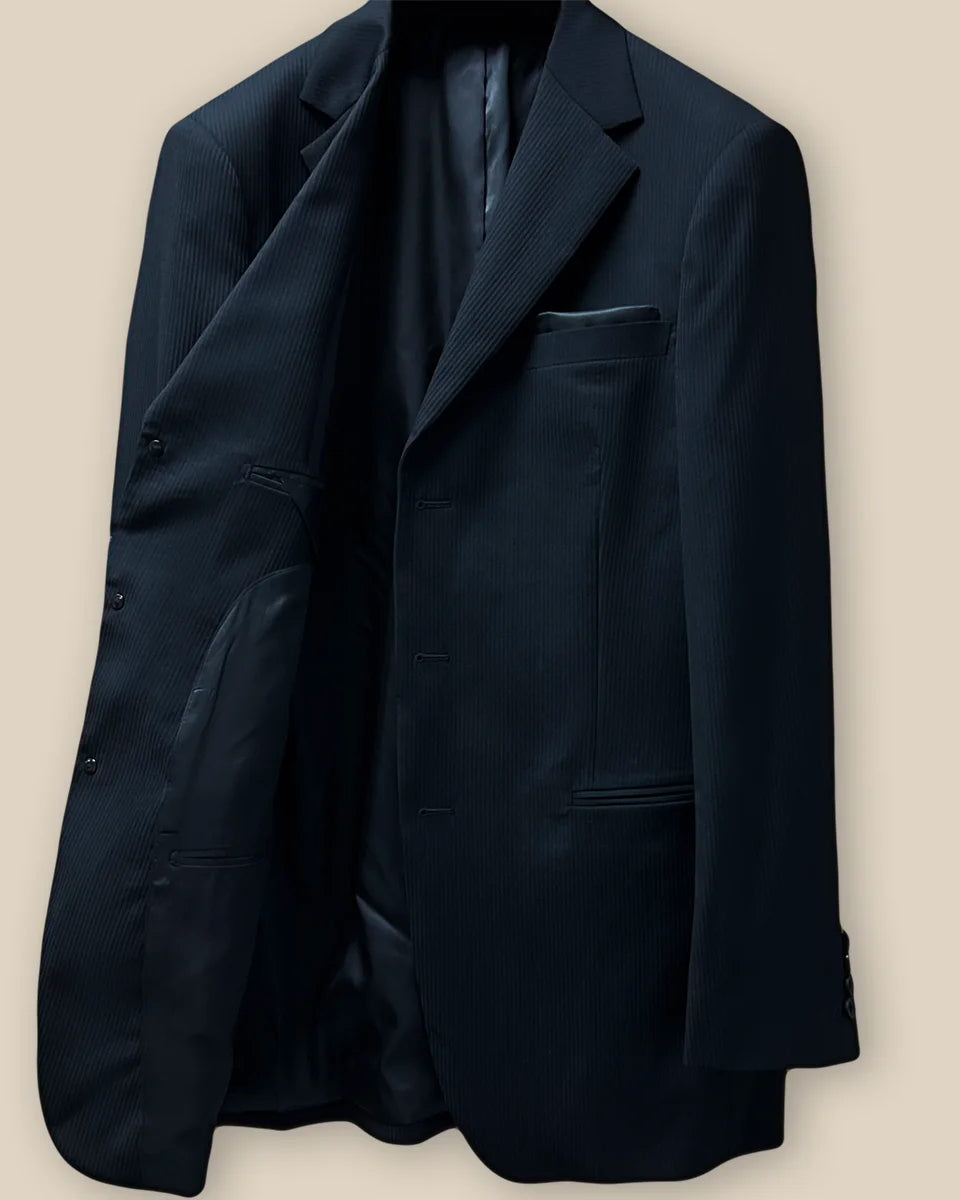 Inside view of the right side of the jacket, showing the black Bemberg lining and pocket details.