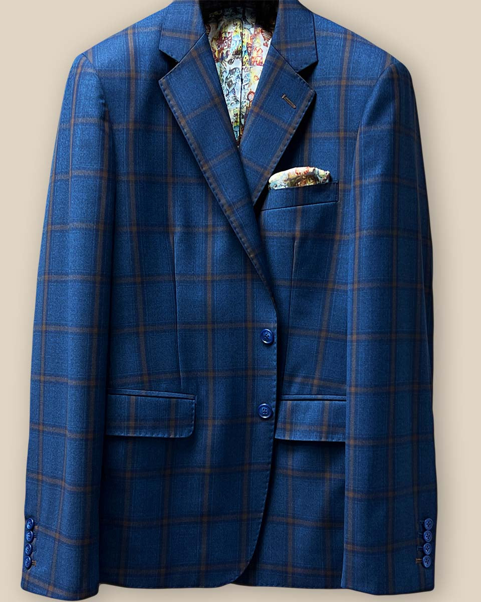 Detailed view of the jacket button panel with blue horn marble buttons and hand pick stitching.