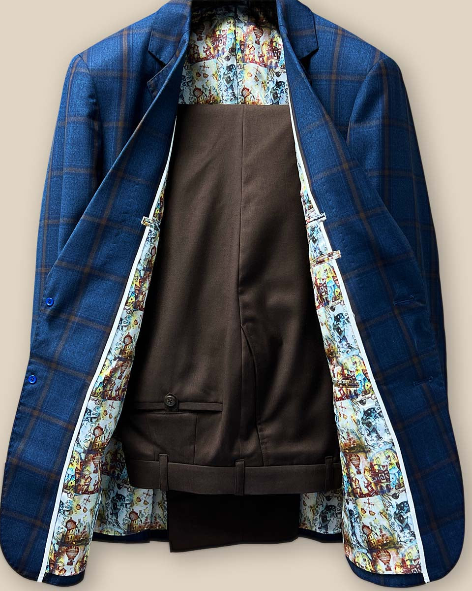 Full view of the two-piece sportcoat and brown pants combination, highlighting the windowpane pattern and complementary colors.