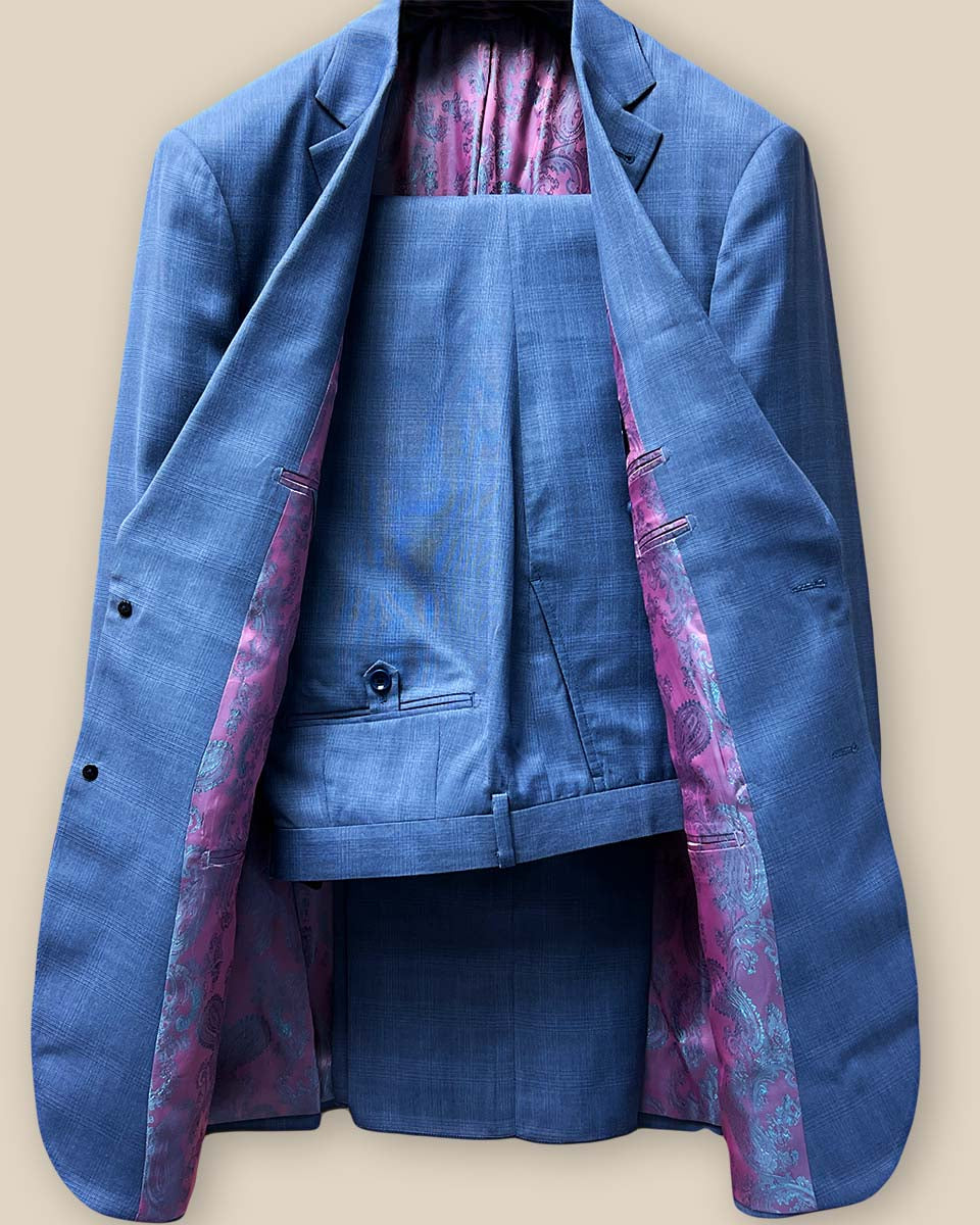Full two-piece view of the medium blue Prince of Wales glen plaid suit, highlighting its elegant design and fit.