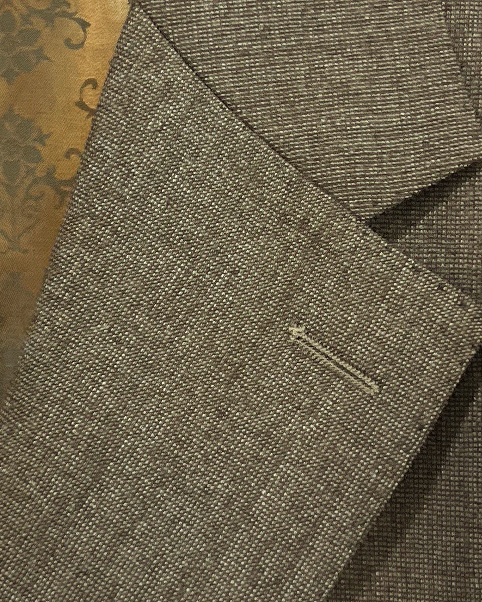 Close-up of the notch lapel on the Westwood Hart brown nailhead men's suit, showcasing the classic style.