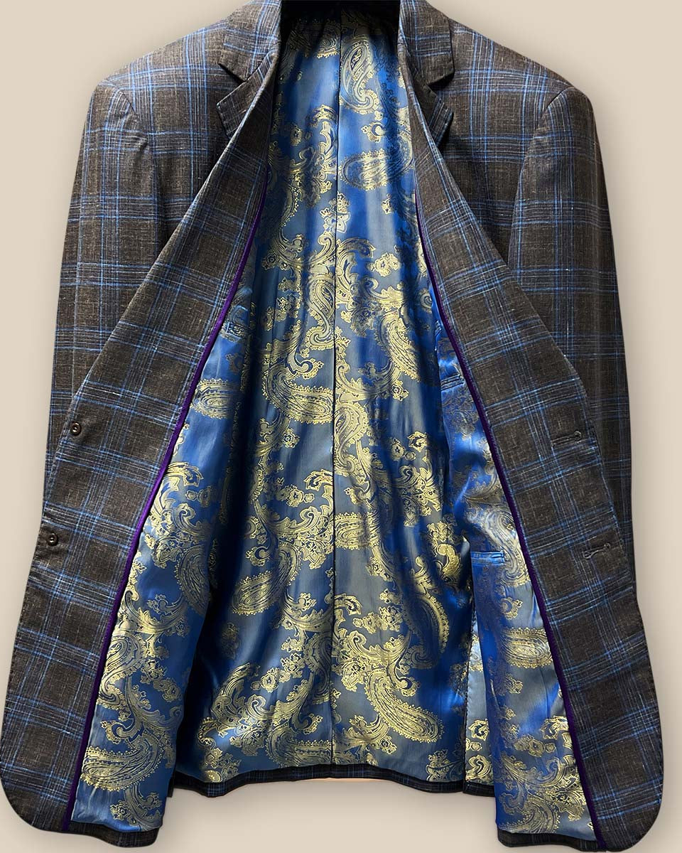 Full inside view of the sportcoat showing the blue and gold paisley fancy lining.