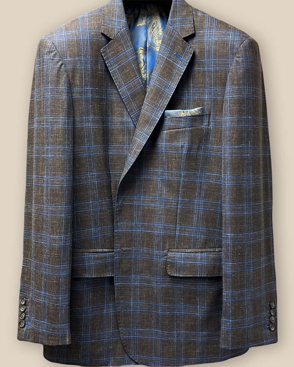 Close-up view of the jacket buttonhole panel showcasing the chocolate brown with blue windowpane plaid fabric.