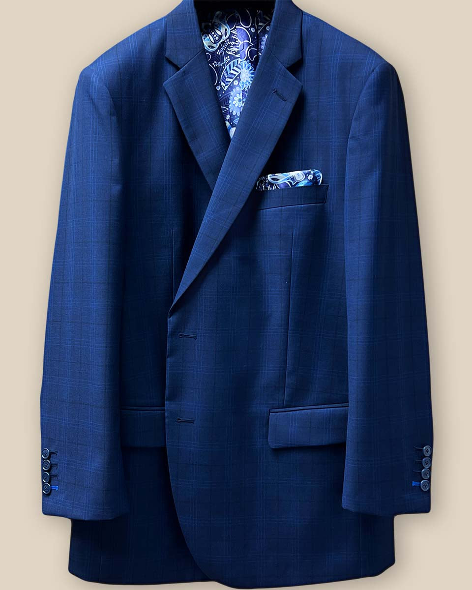 Close-up of the dark blue windowpane men's sport coat's buttonhole panel featuring royal blue accent stitching.