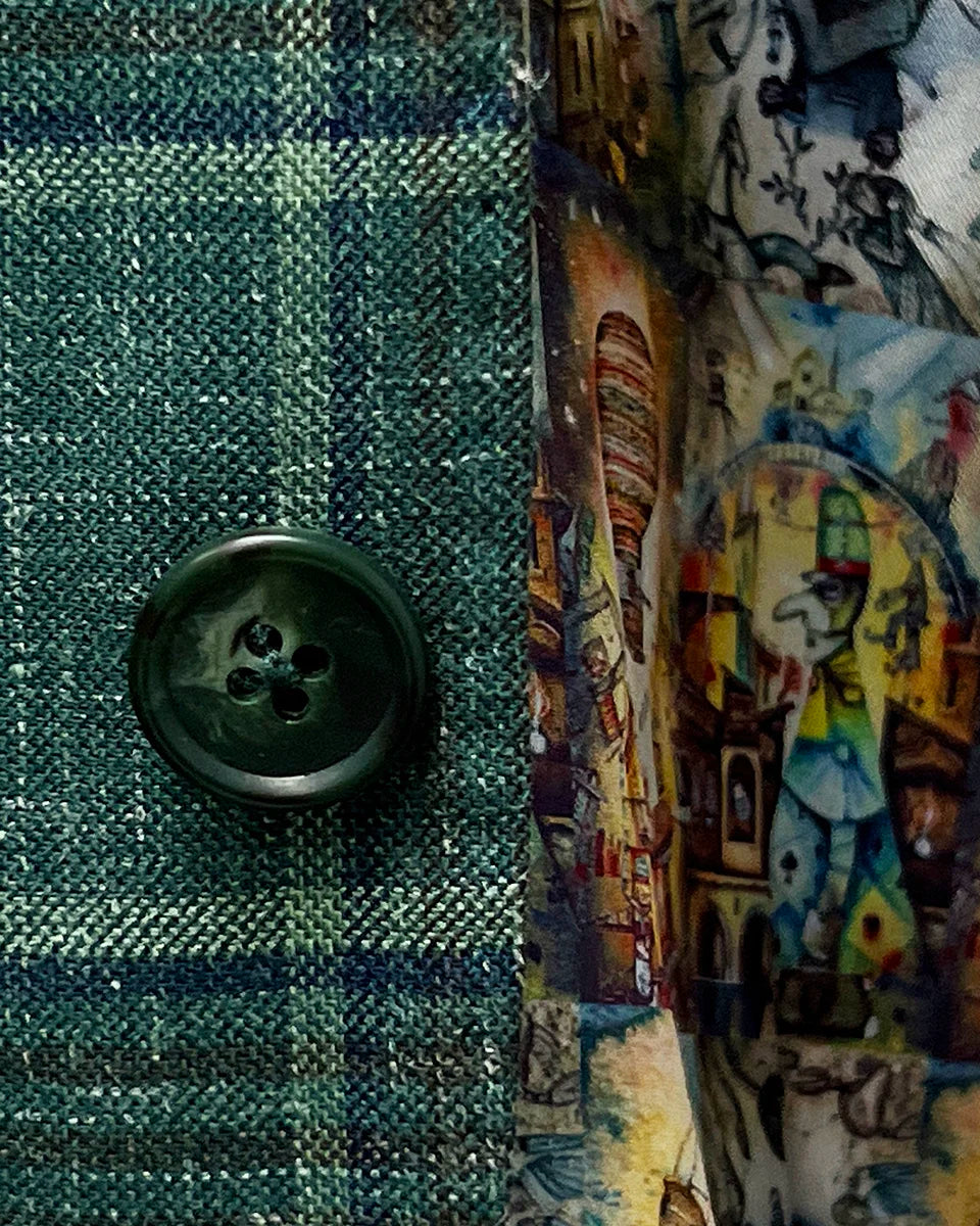 Dark green horn buttons on the Westwood Hart hunter green with navy and chocolate brown plaid mens sport coat, adding a classic touch.