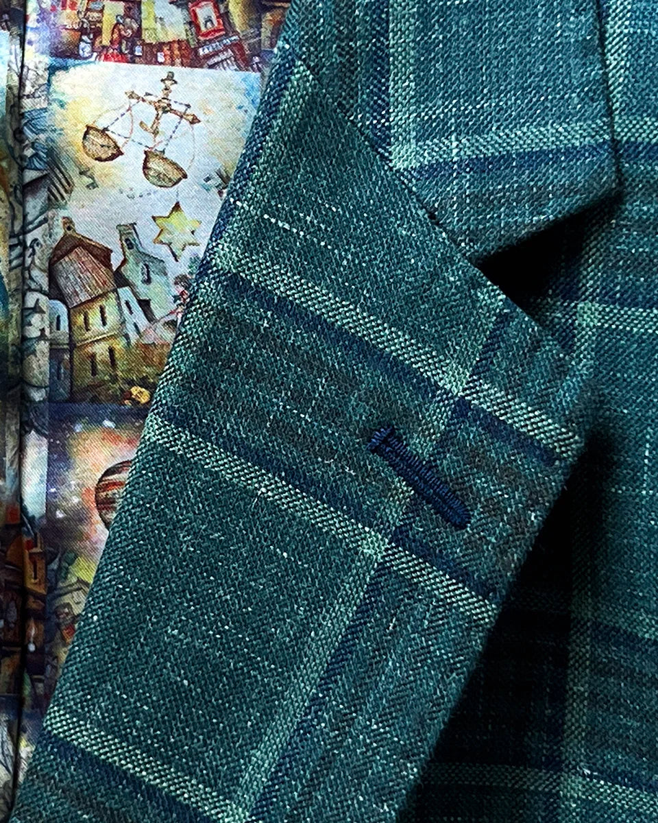 Detailed view of the notch lapel on the Westwood Hart hunter green with navy and chocolate brown plaid mens sport coat, featuring precise craftsmanship.