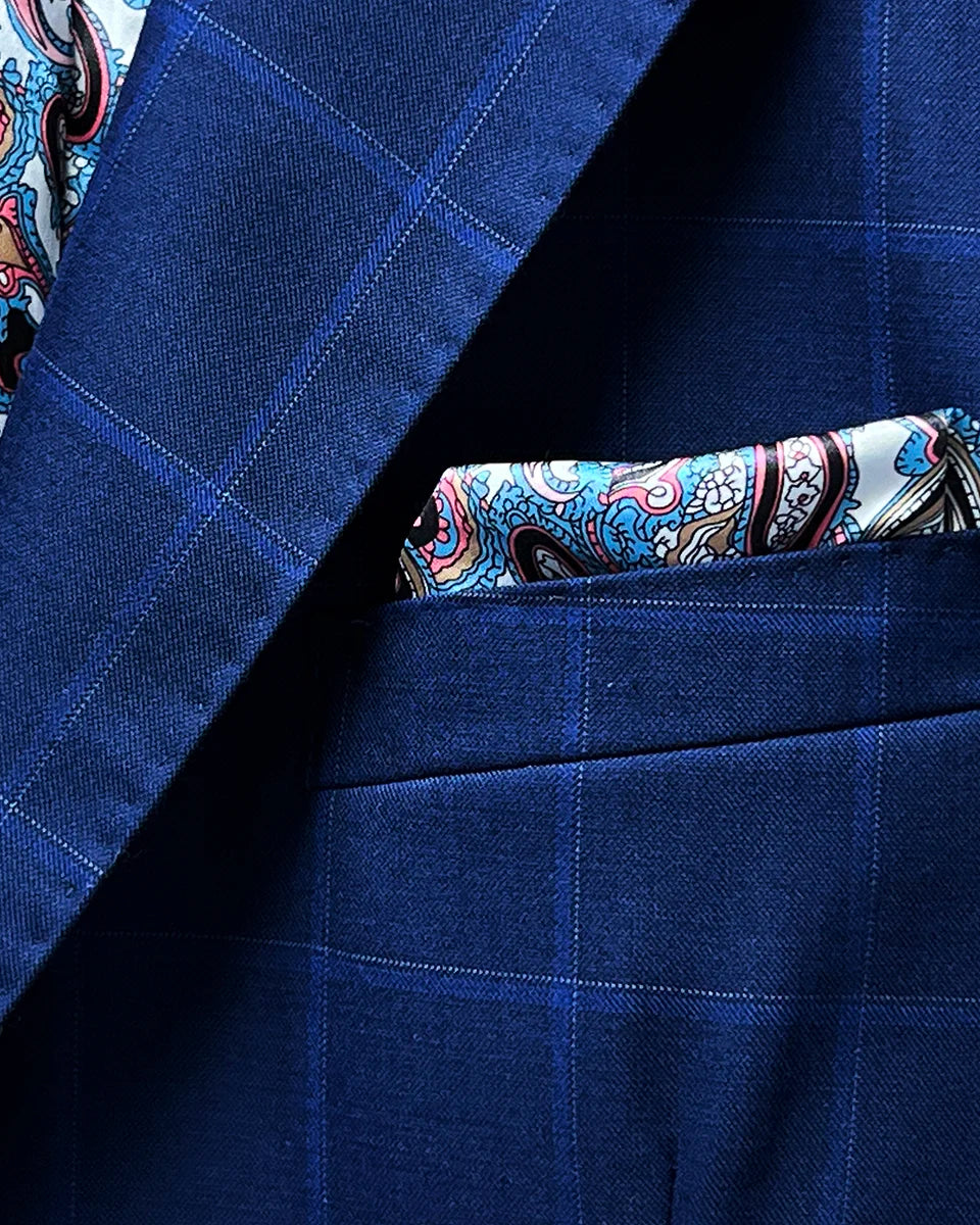 View of the built-in pocket square in the royal blue suit with navy and white windowpane design.