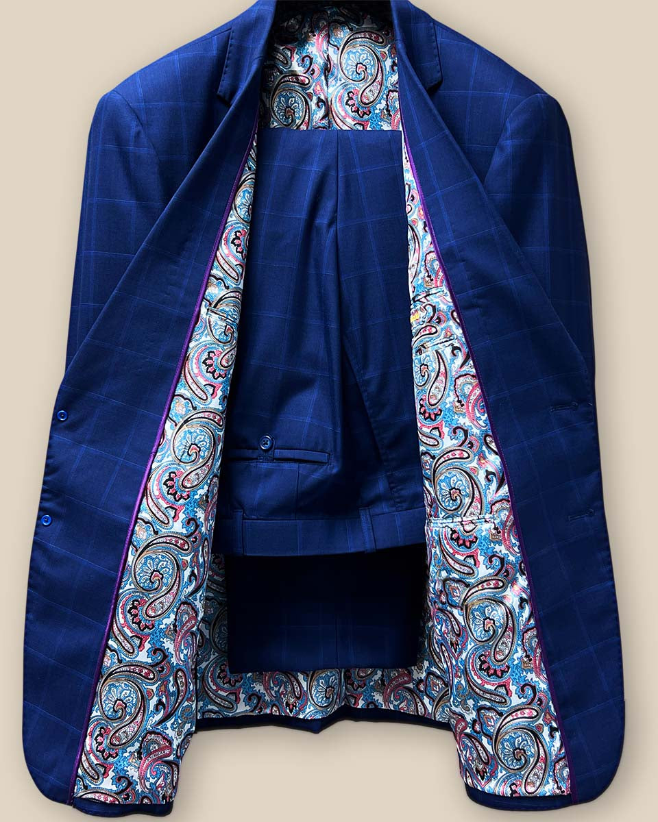 Front view of the two-piece royal blue suit with a navy and white windowpane design, notch lapel, and straight flap pockets.