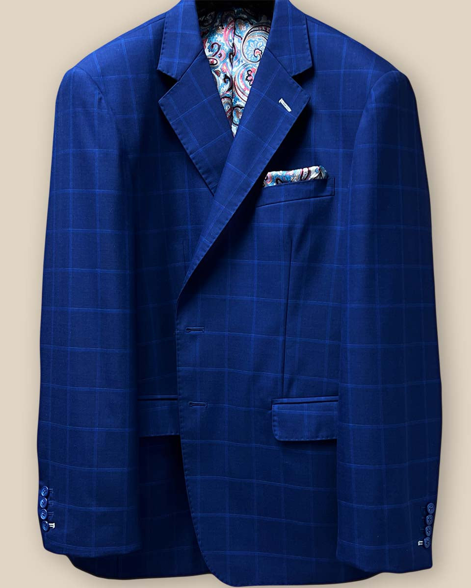 Close-up view of the jacket buttonhole panel showcasing the white contrast buttonholes on the royal blue fabric with navy and white windowpane design.