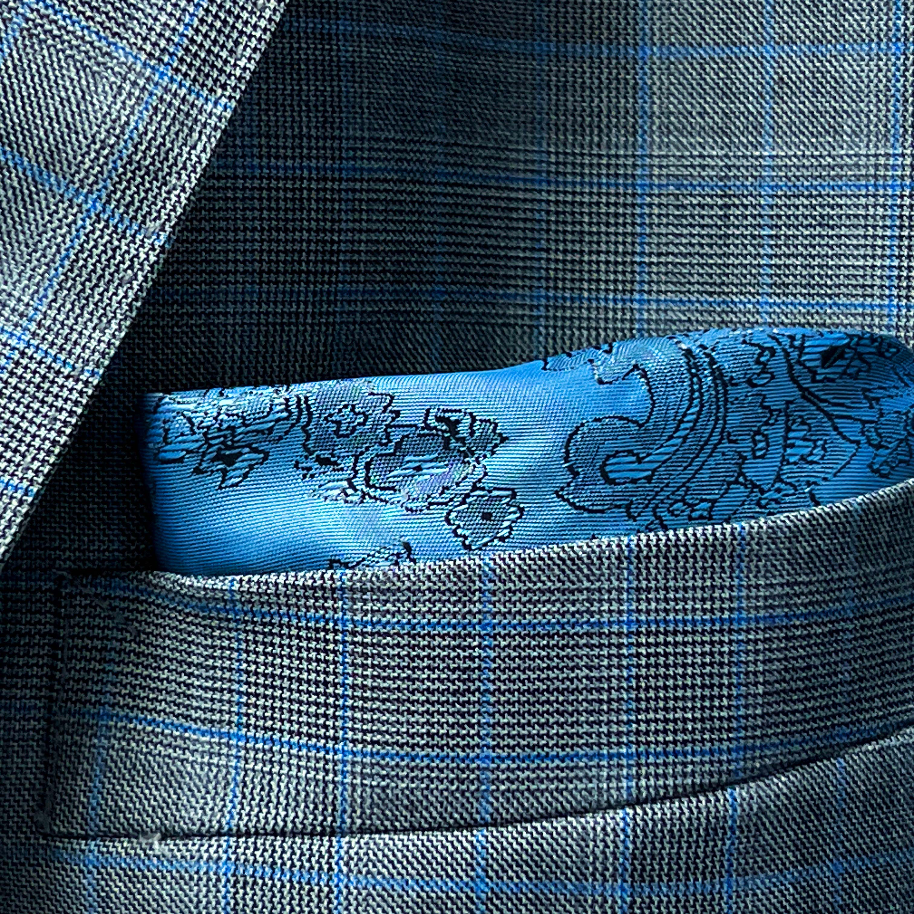 Blue check suit tailored fit, showcasing Westwood Hart's precision.