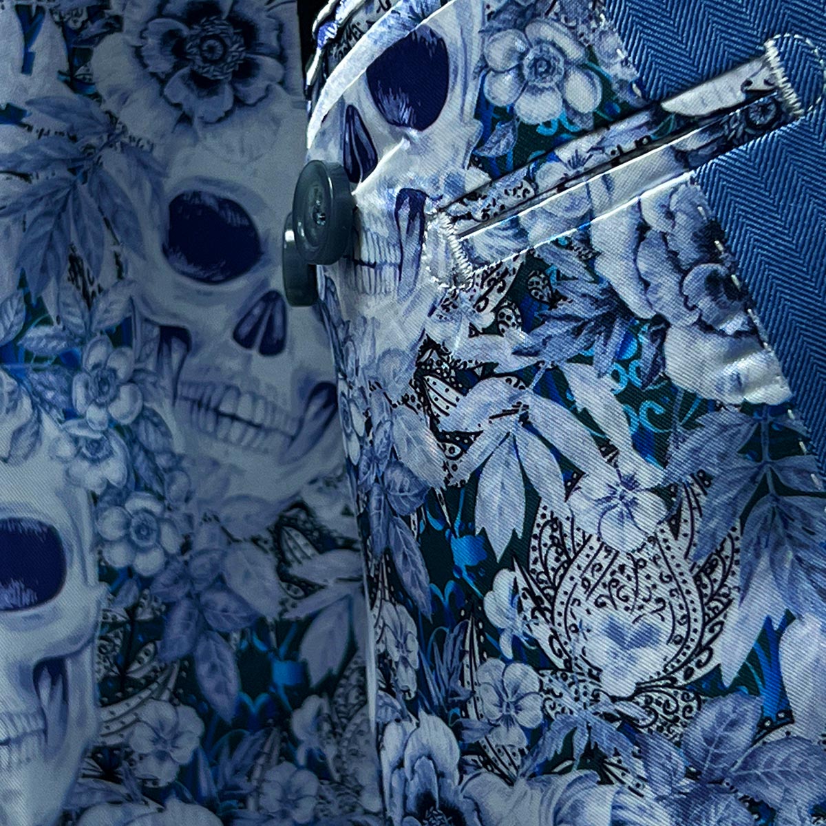 Men's blue herringbone suit crafted from 100% Super 120s Australian Merino wool for unparalleled comfort.