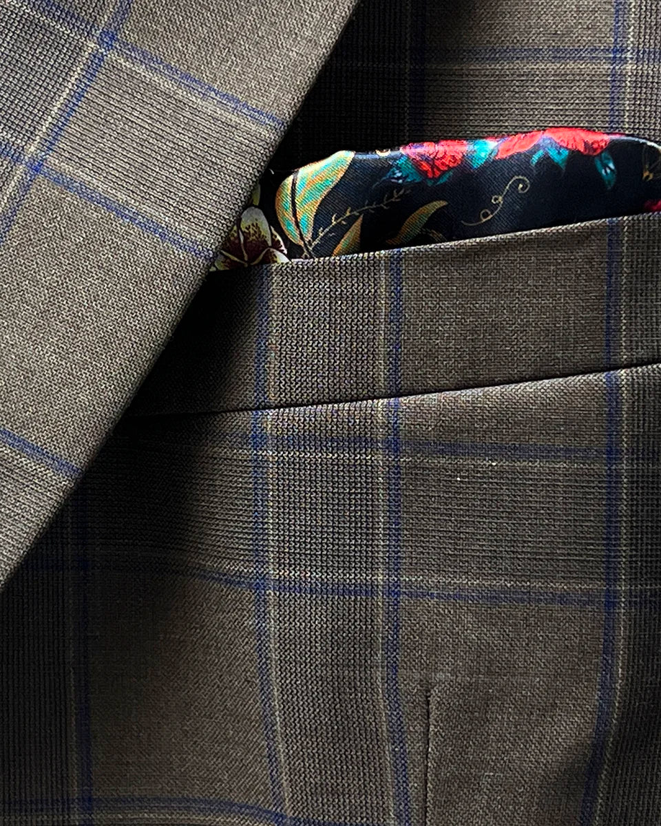 View of the built-in pocket square feature on a chocolate brown sportcoat.