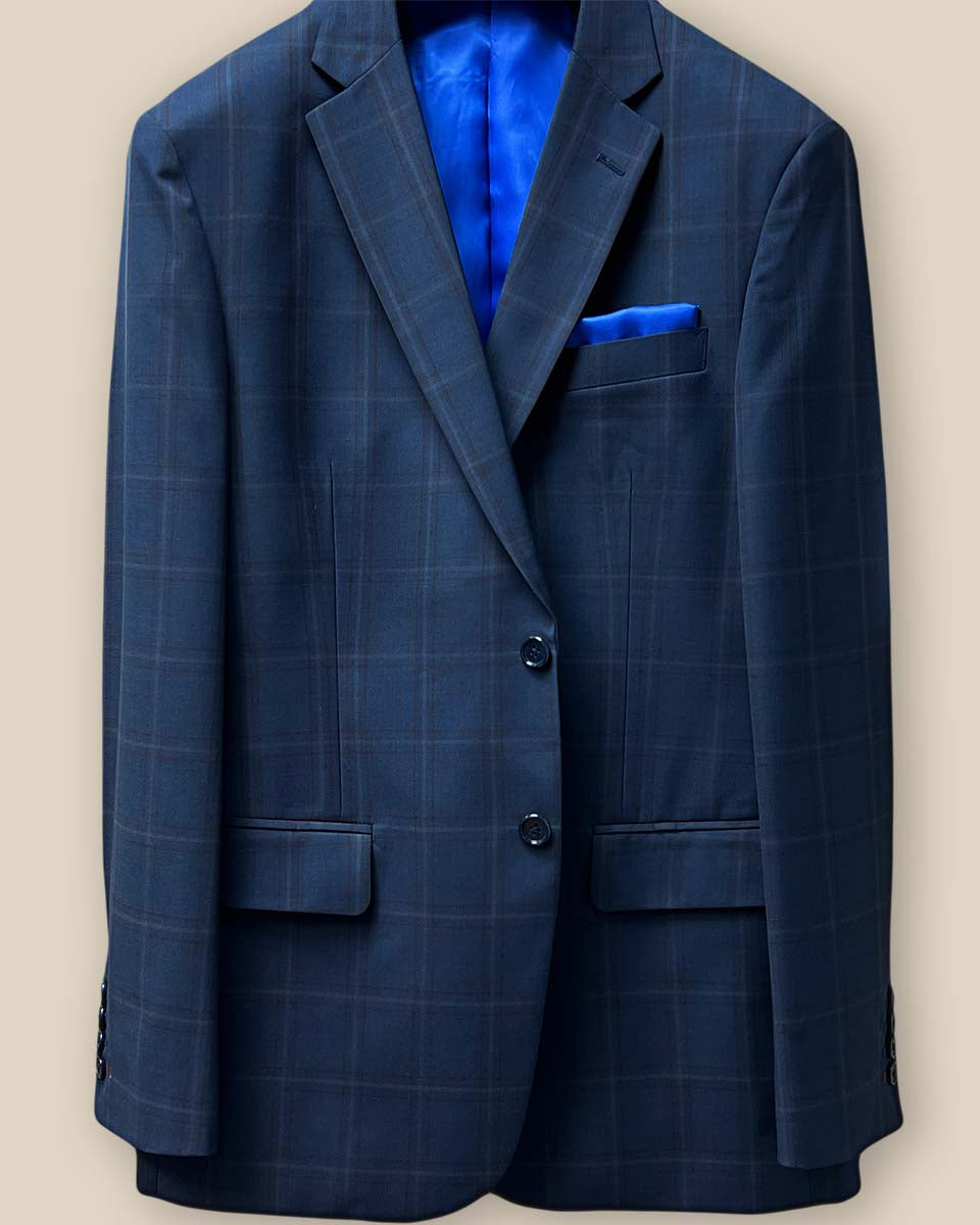 Detailed view of the sportcoat's front button panel with navy horn buttons.