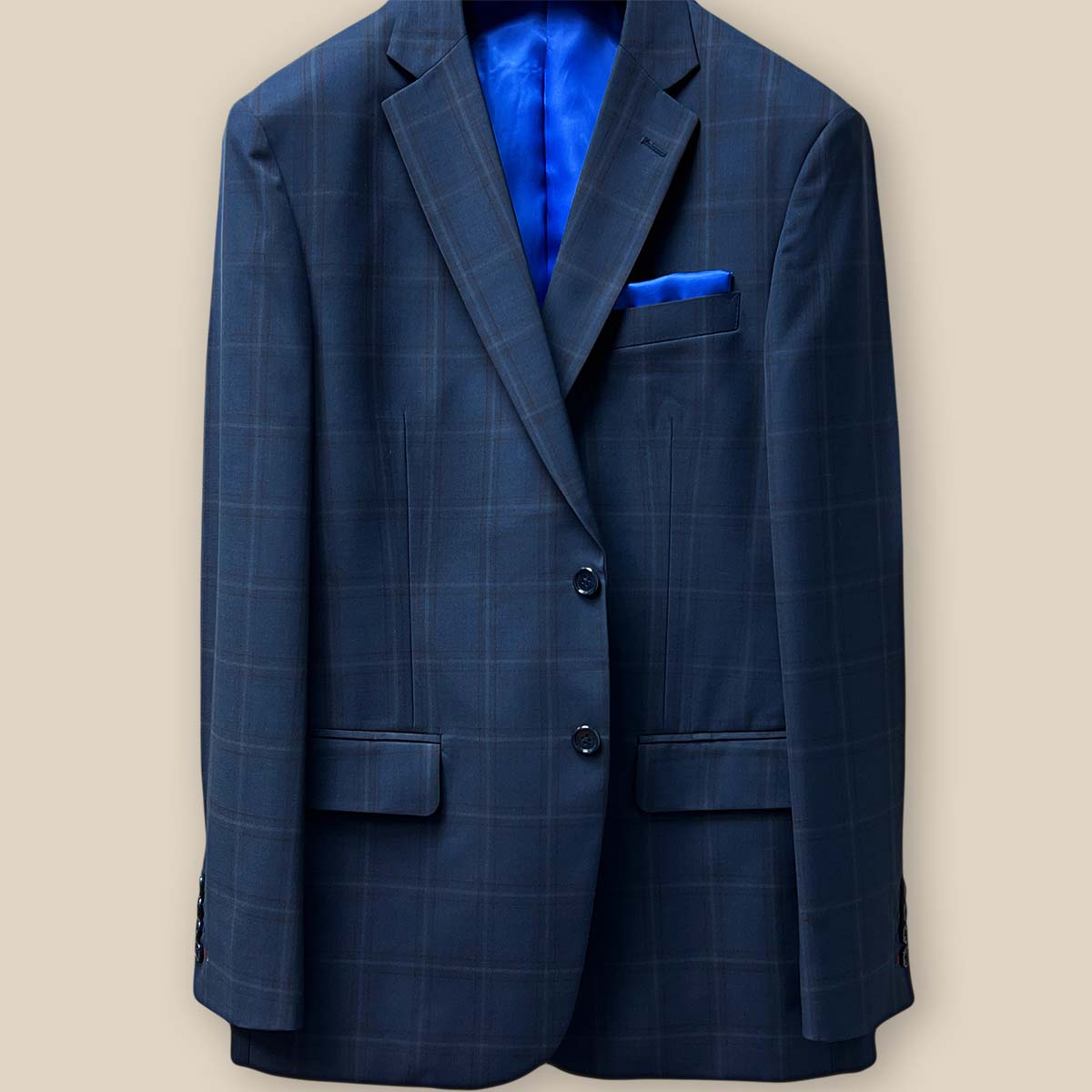 Detailed view of the sportcoat's front button panel with navy horn buttons.