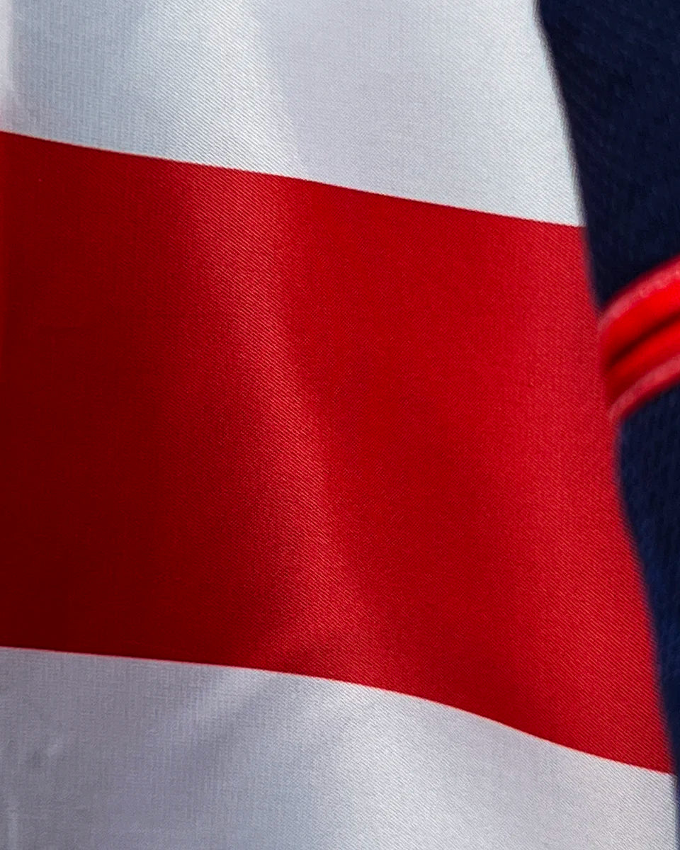 Dynamic motion shot revealing glimpses of the patriotic American flag lining that provides a conversation-starting element for the patriot appreciating quality and heritage