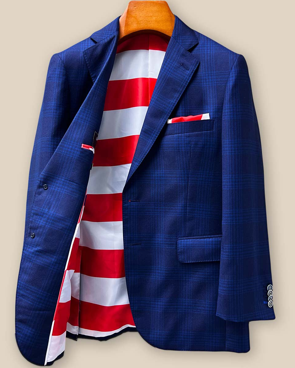 Interior right panel view of the Zegna sportcoat showing impeccable construction details and the patriotic American flag lining that makes a personal statement