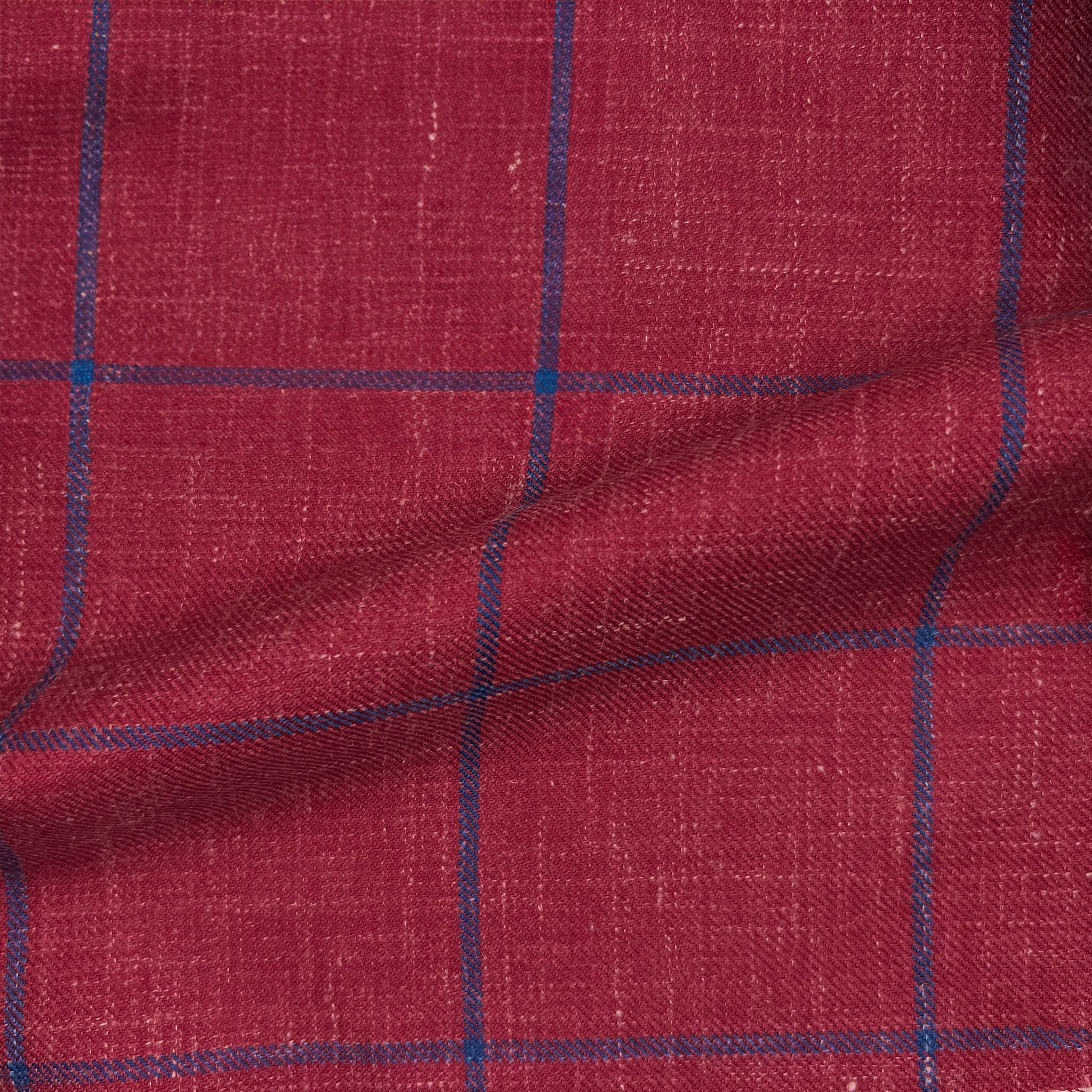 Exclusive hand-sewn rust maroon sportcoat, epitomizing stylish and trendy suit fashion.