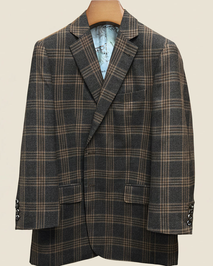 Close-up view of brown rust block windowpane sport coat showing hand-sewn Milanese buttonhole with detailed stitching on lapel