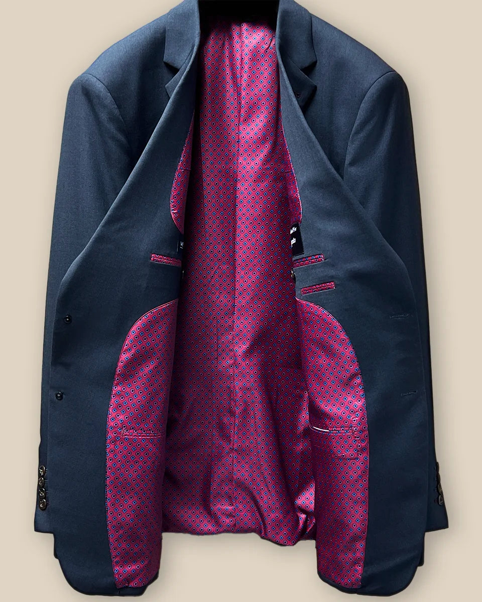 Inside view of a charcoal grey men's suit jacket