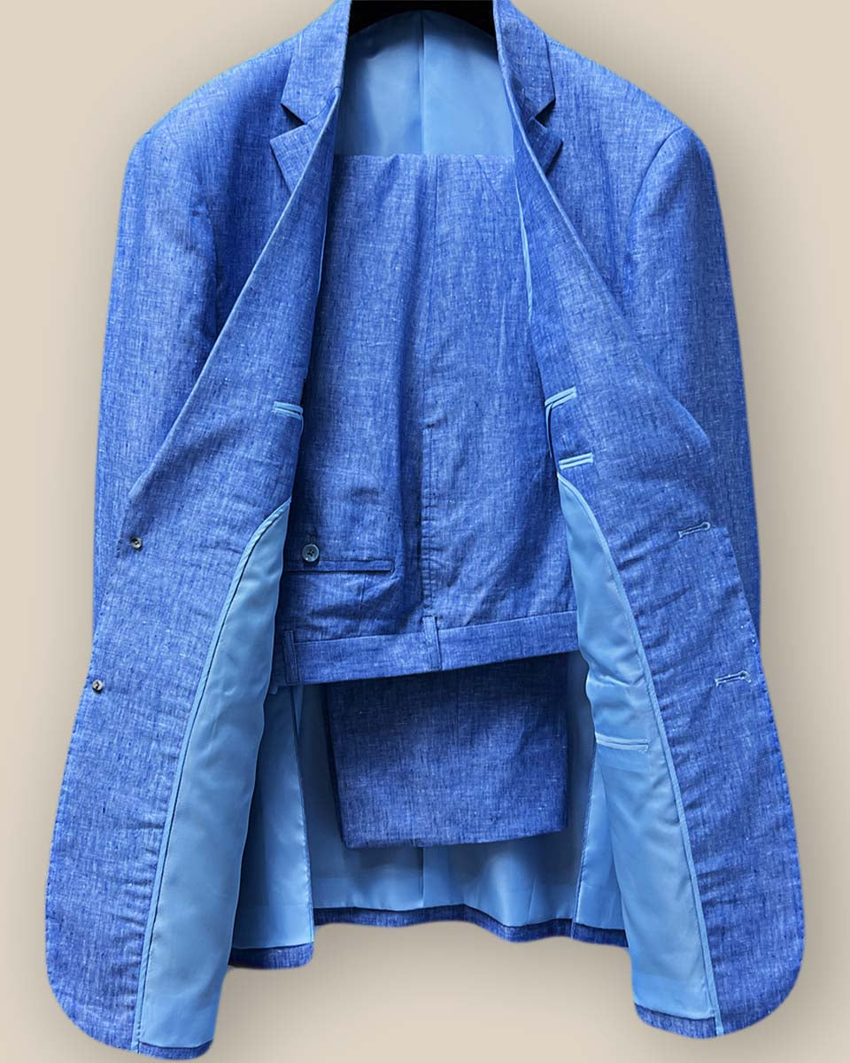 Front view of complete light blue solid Irish linen two-piece men's suit
