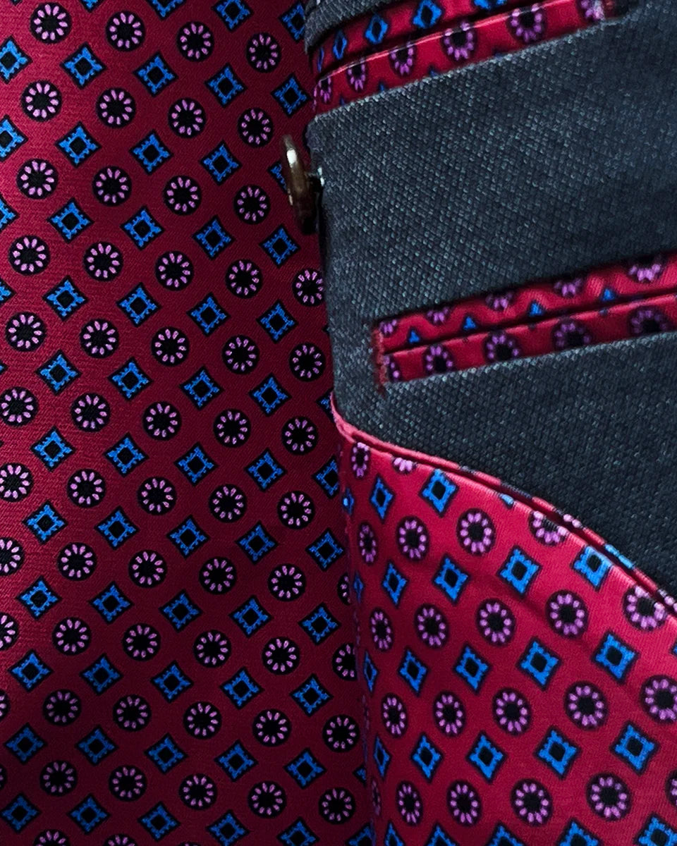 Lining of a charcoal grey basket weave suit