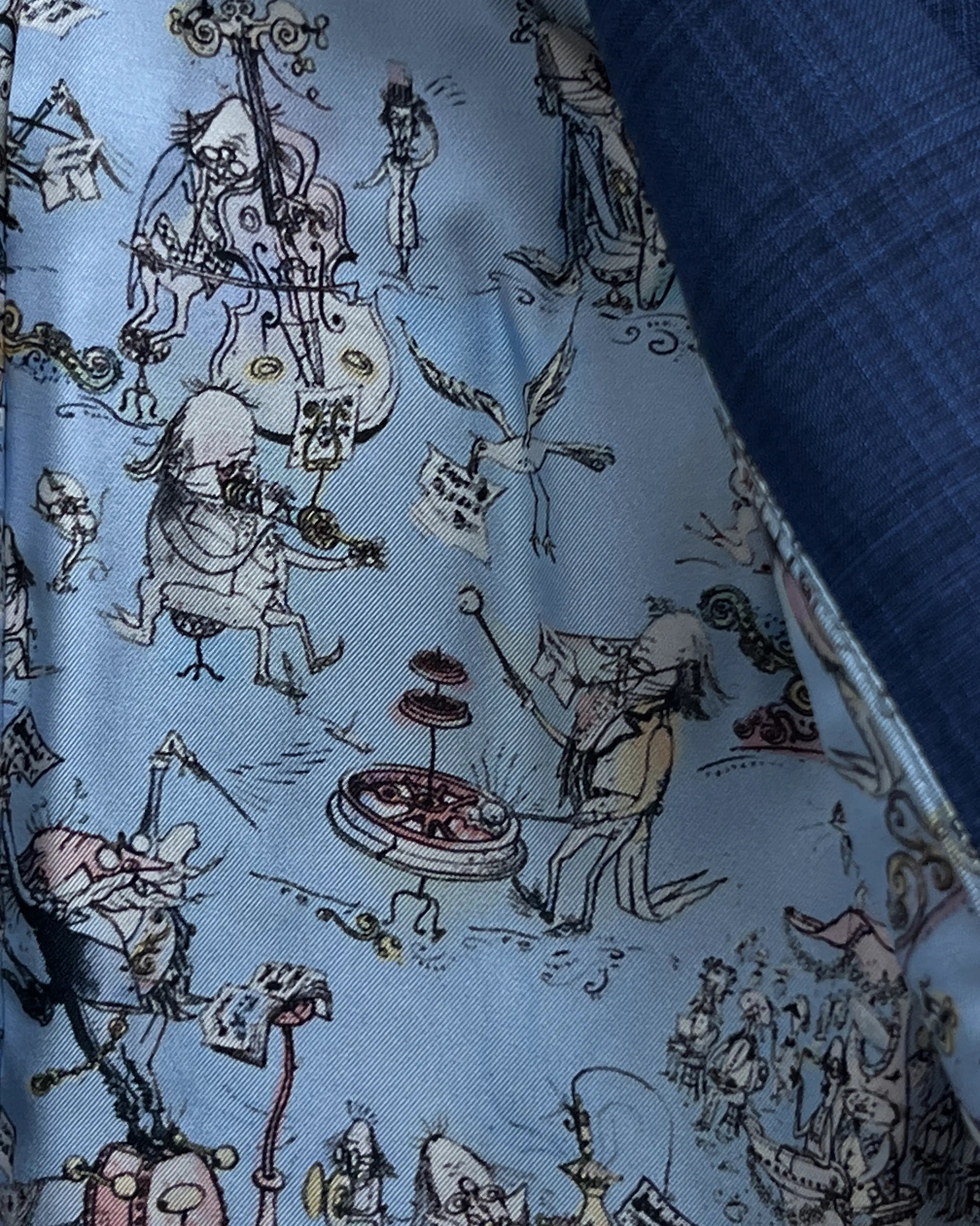 Lining detail of blue windowpane check men's suit showing Carnet LNS513 bemberg silk lining
