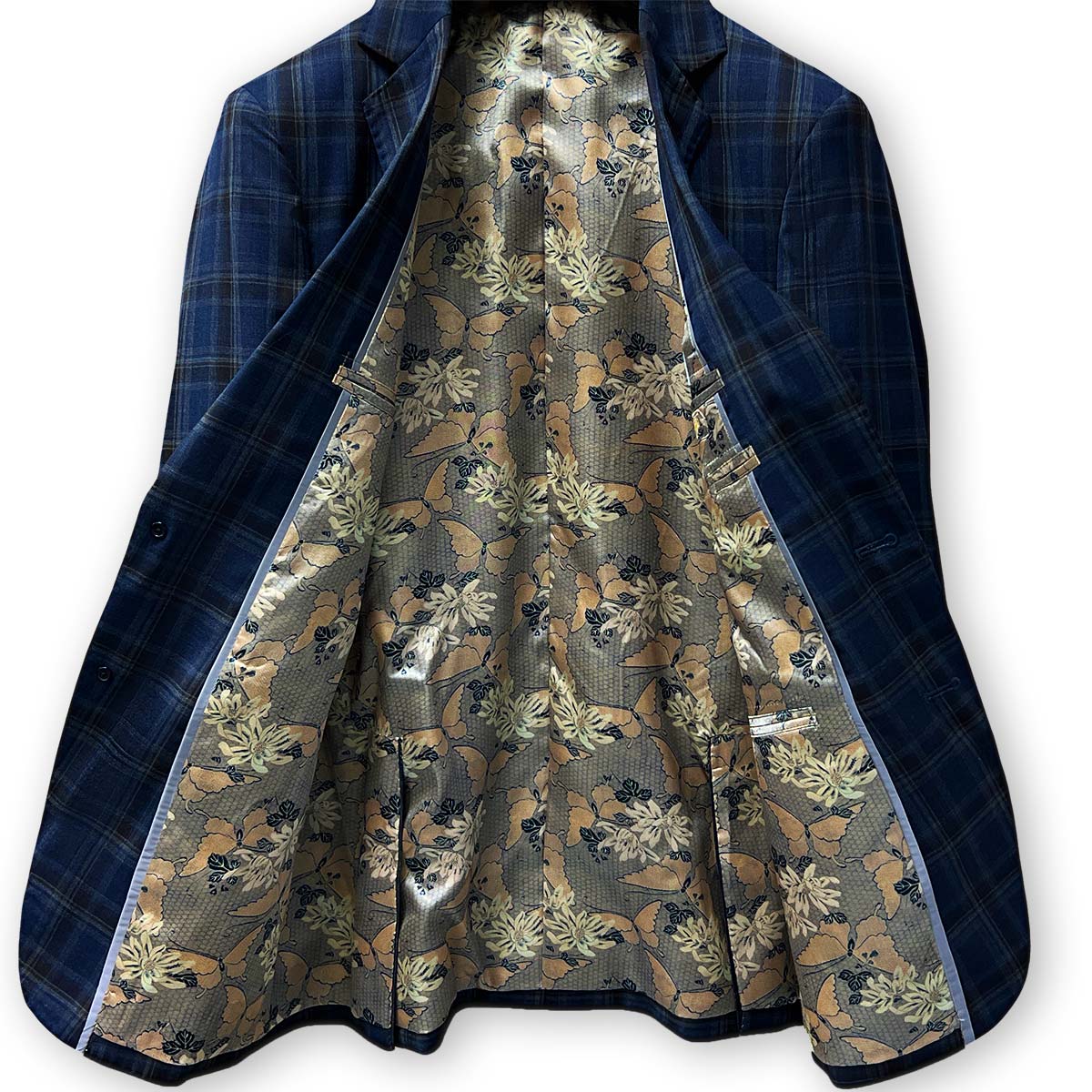 Find tailoring near you with Westwood Hart's dark blue and brown plaid, 100% Australian Merino wool suit.