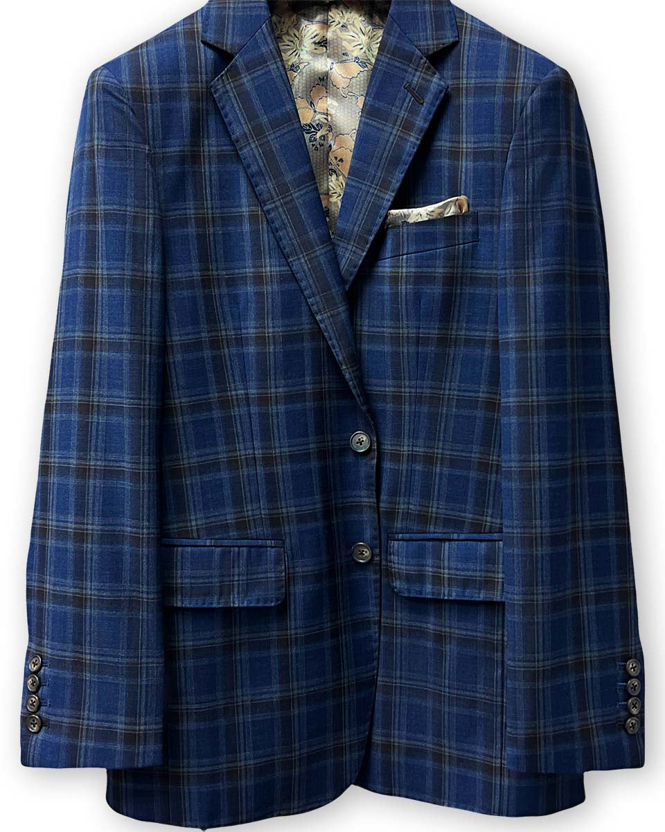 Ideal for grooms, a dark blue and brown plaid 100% Australian Merino wool suit by Westwood Hart.
