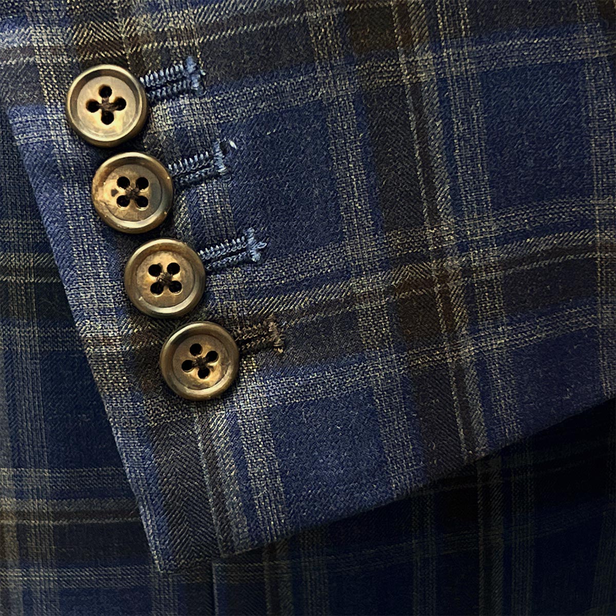 Dark blue and brown plaid suit by Westwood Hart, an alternative to Men's Wearhouse offerings.