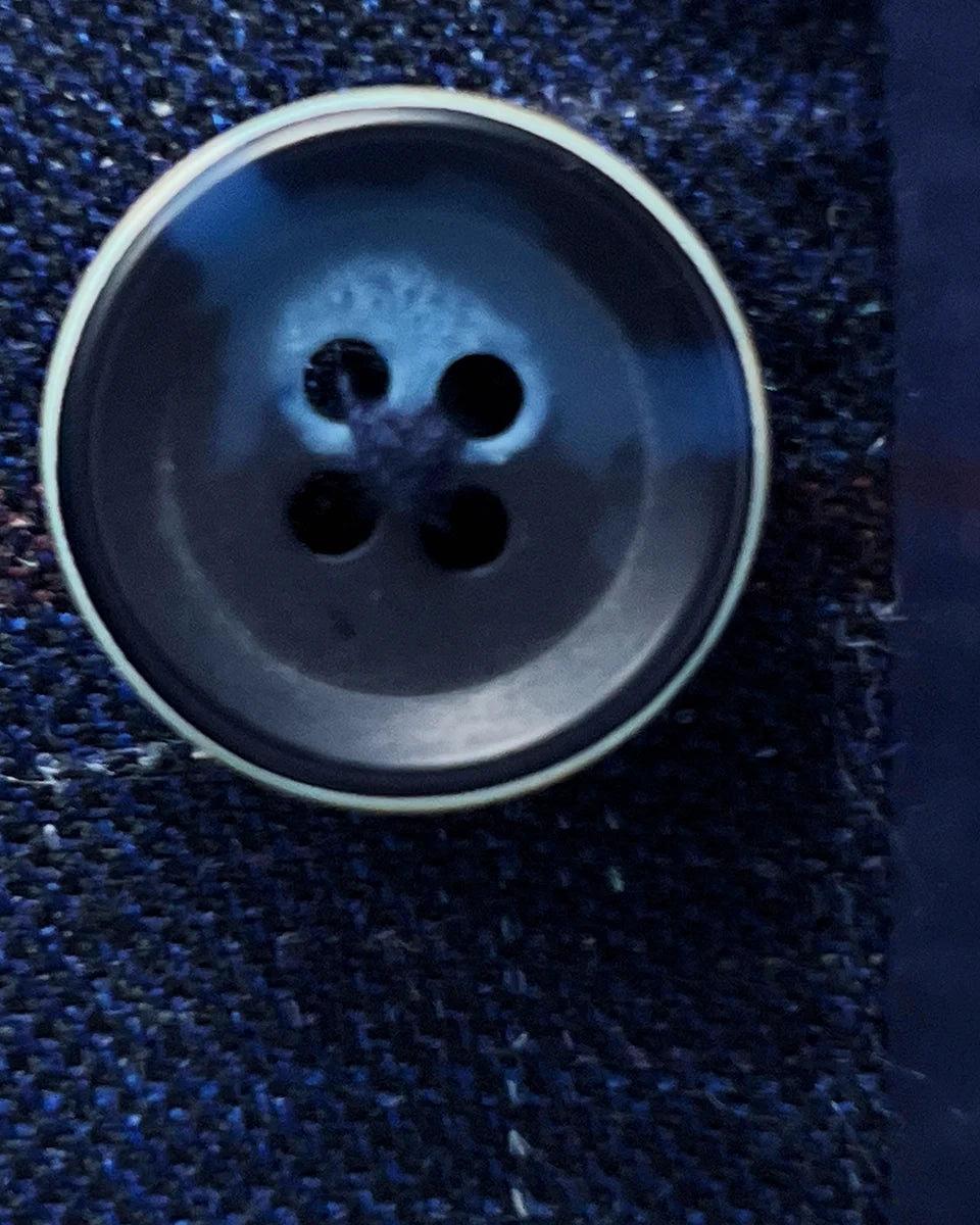 Alternative button option showing horn marble buttons on navy windowpane sport coat for different styling preferences