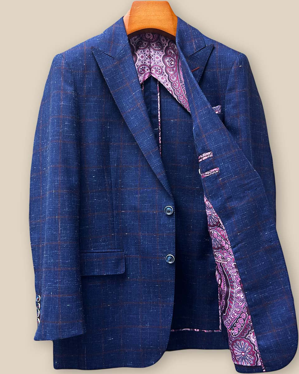 Interior left side view of navy windowpane sport coat showing half-lining construction, inner pocket placement, and quality wool-linen fabric drape