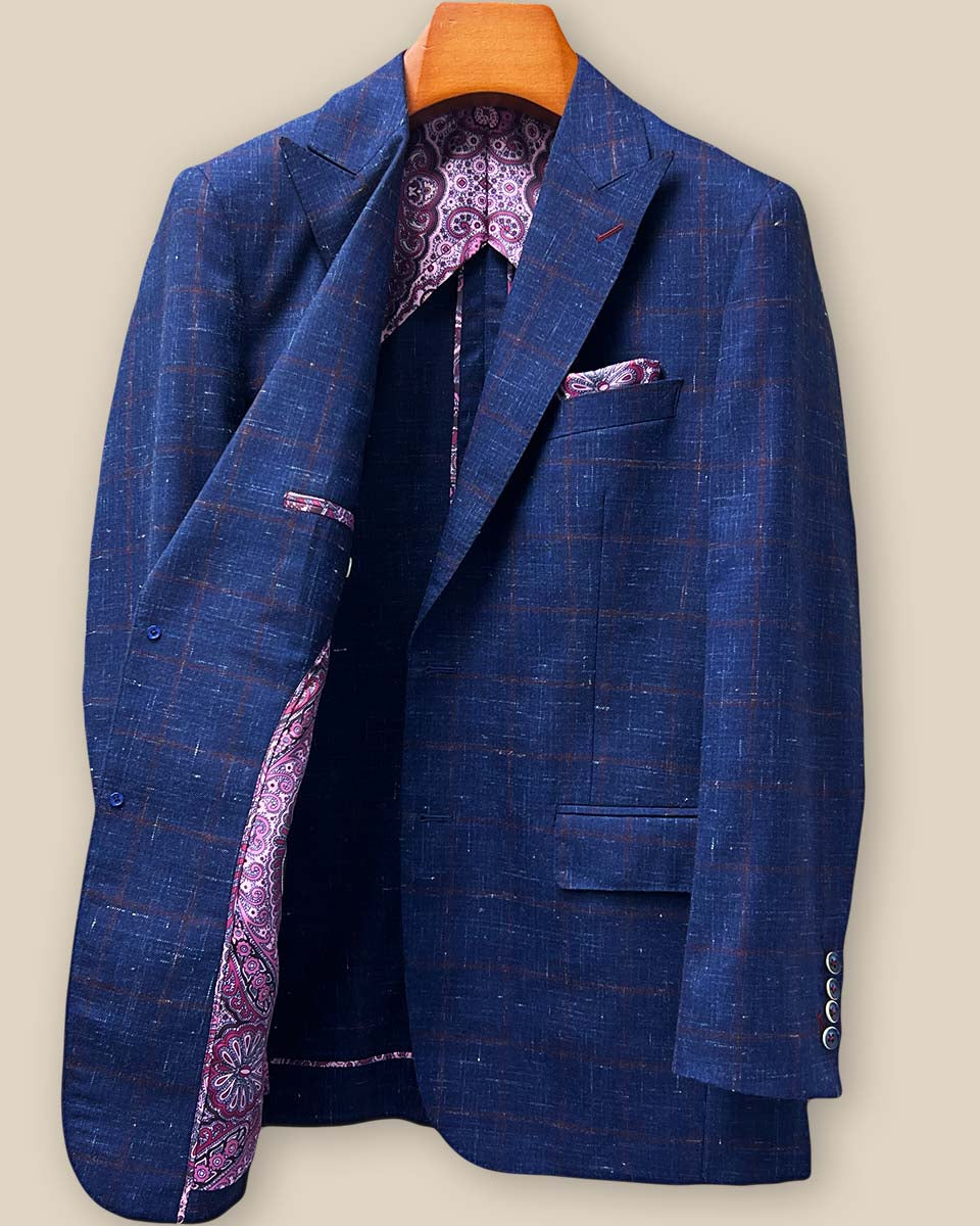 Interior right side view of navy windowpane sport coat revealing half-lining construction, internal pocket configuration, and quality craftsmanship details