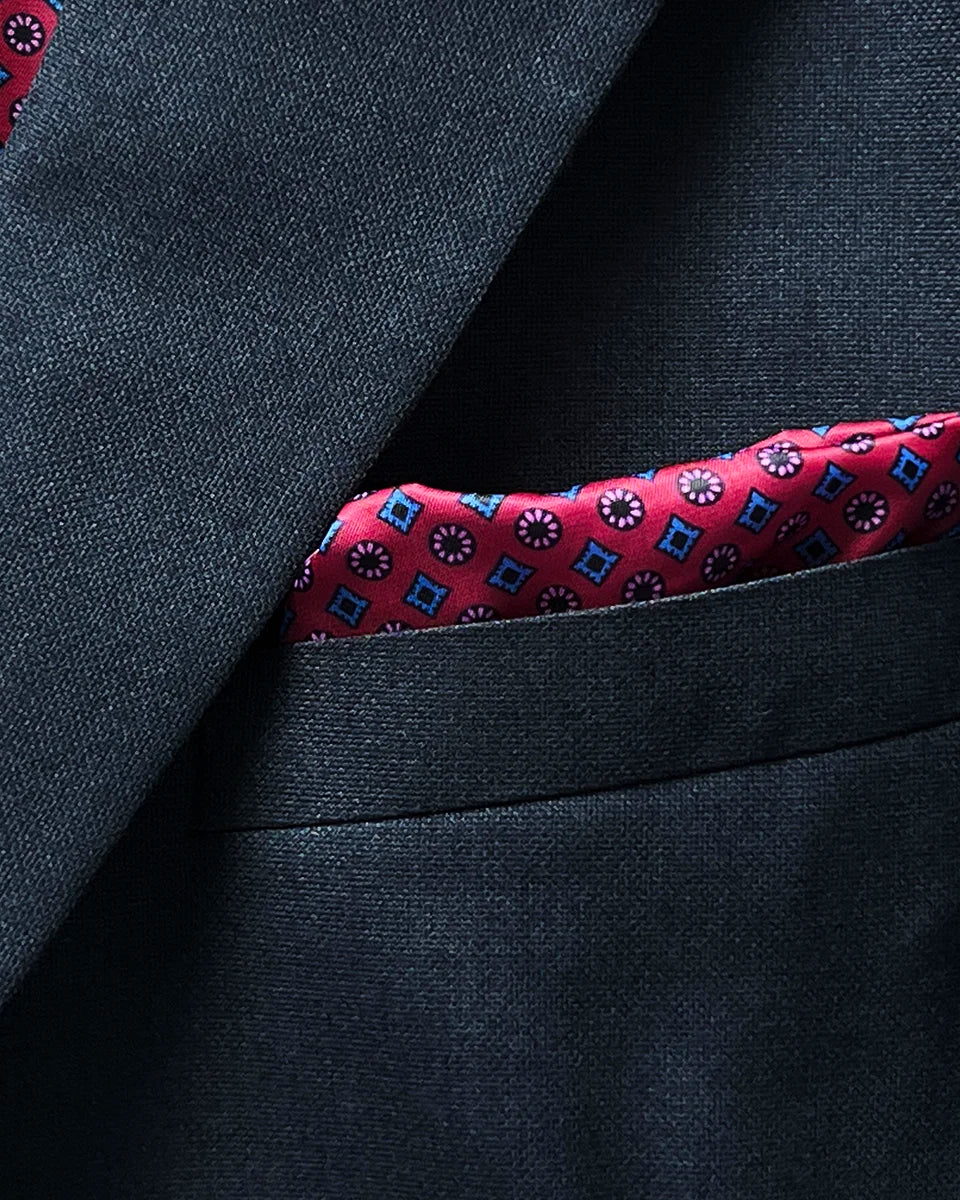 Pocket square in a charcoal grey suit jacket
