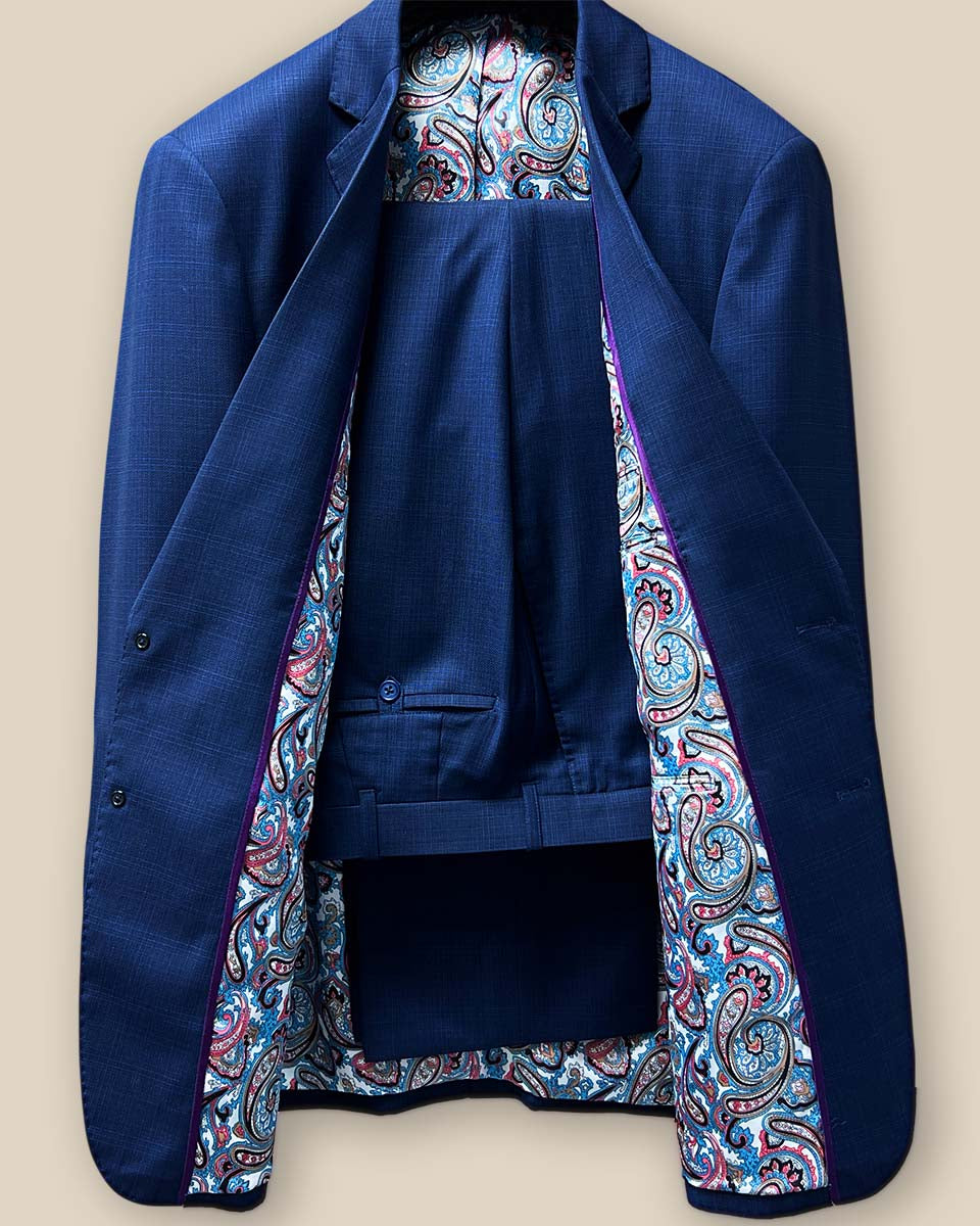 Full view of the two-piece royal blue suit, displaying the blue on blue micro check jacquard design.