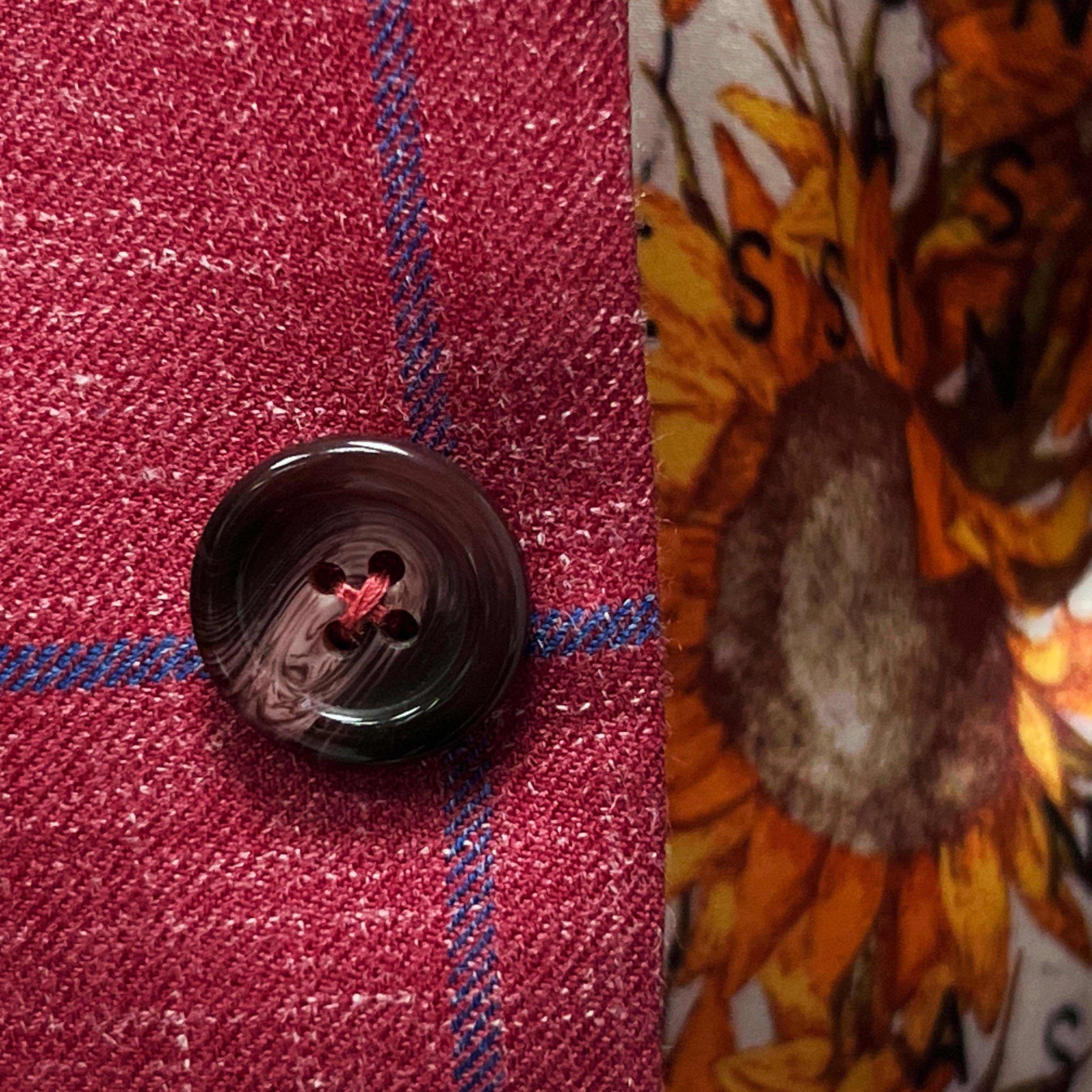 Lookbook snapshot of trendy suits - featuring the rust maroon sportcoat.