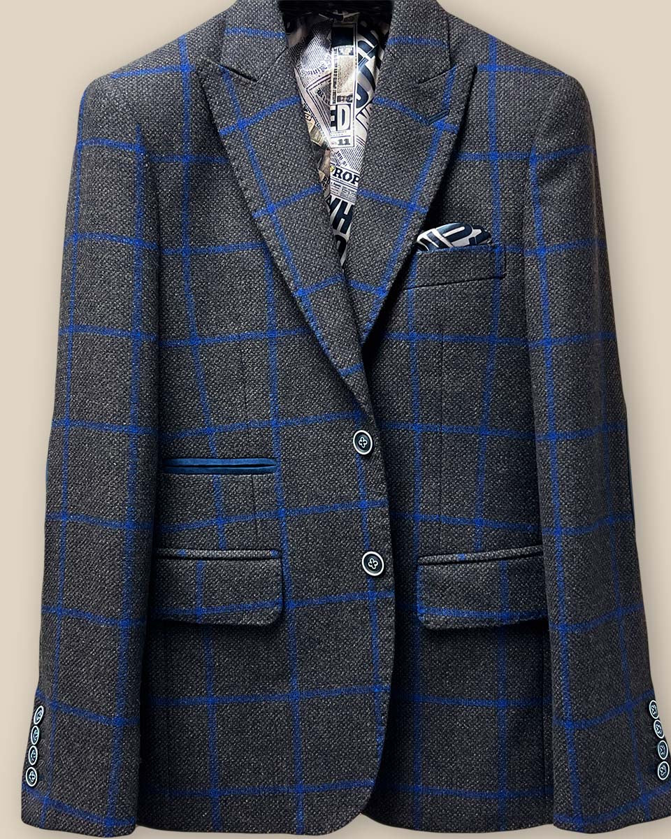 Close-up of the jacket button panel with navy horn buttons featuring white trimming on the Westwood Hart sportcoat.