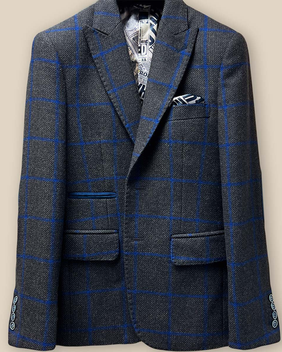 Close-up of the jacket buttonhole panel on the Westwood Hart brown with royal blue windowpane sportcoat.