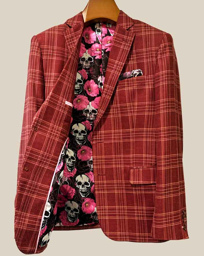 Interior right side of burgundy plaid sport coat revealing floral skulls lining and internal construction details