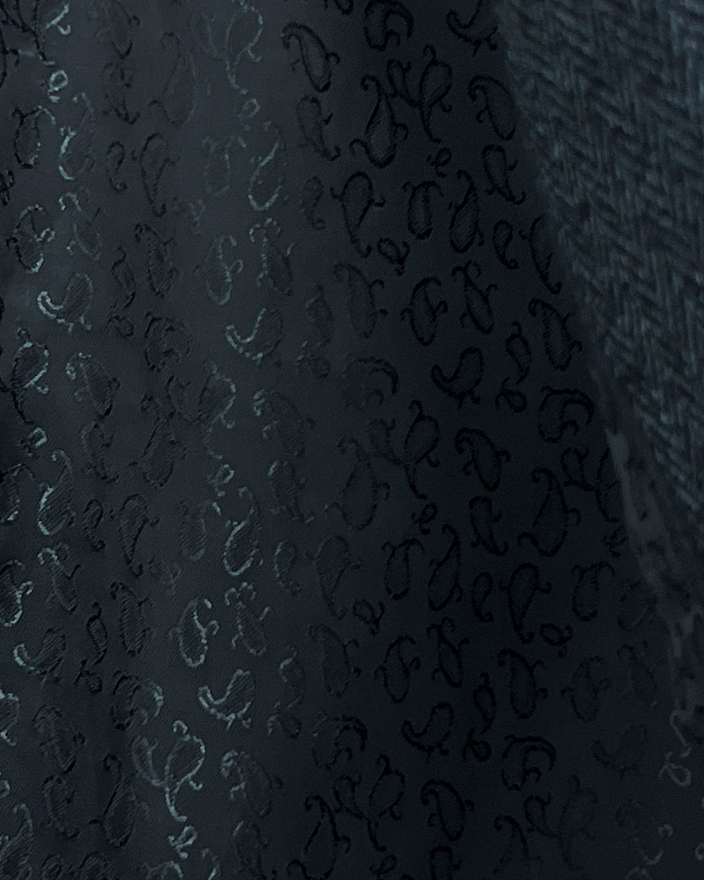 Black paisley flash lining detail visible at jacket cuffs and vents