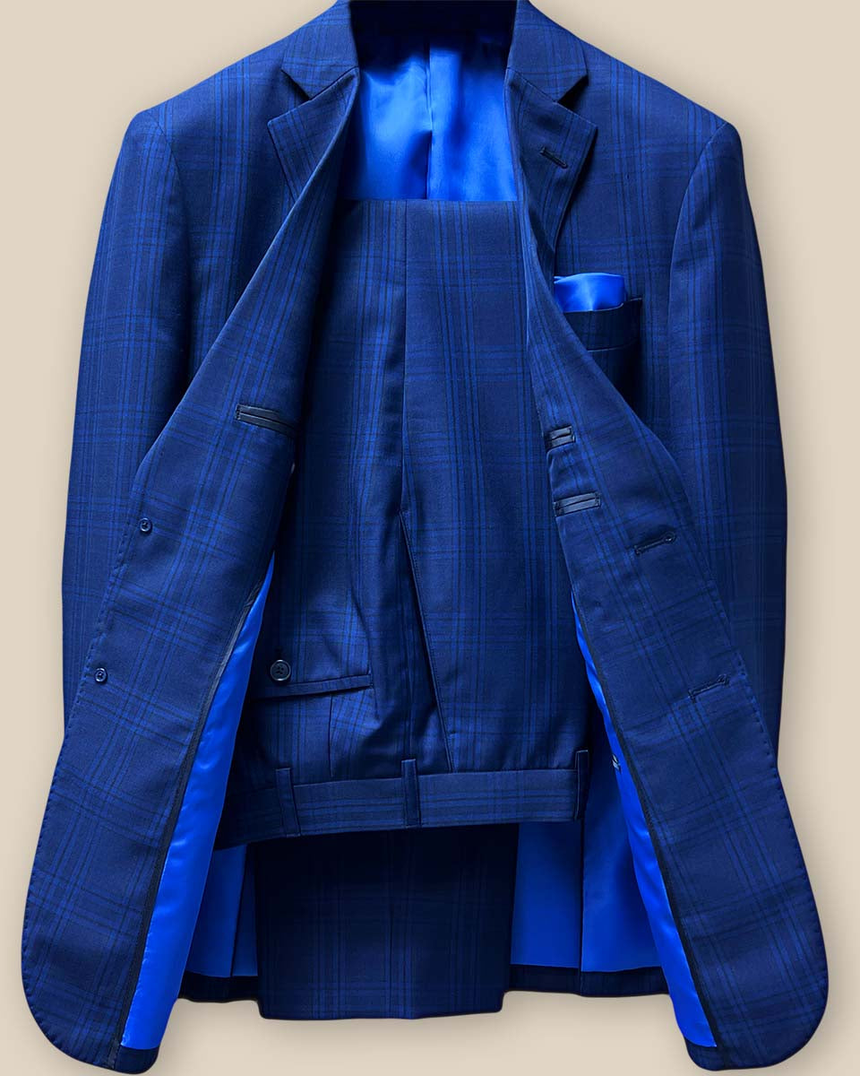 Front view of two-piece dark blue Westwood Hart suit with windowpane pattern, notch lapels, and flap pockets