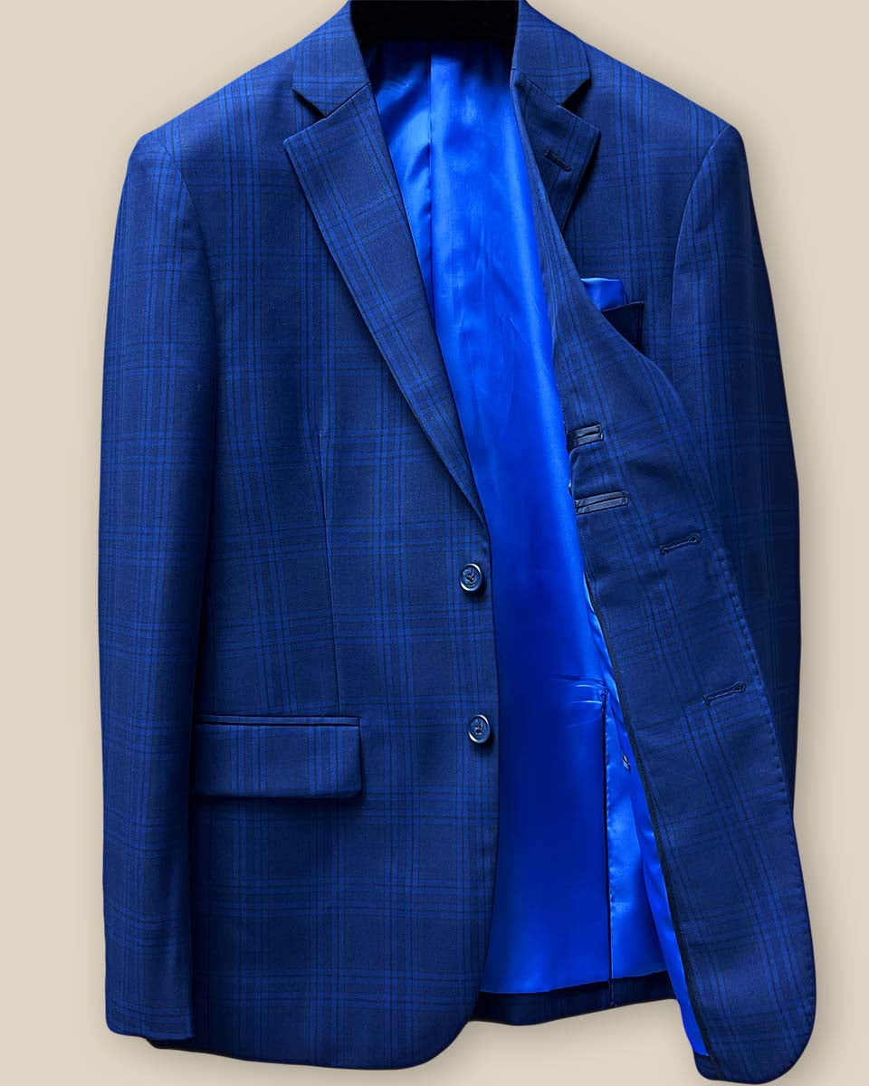 Interior view of dark blue Westwood Hart suit jacket, showcasing royal blue silk bemberg lining and left inner pocket