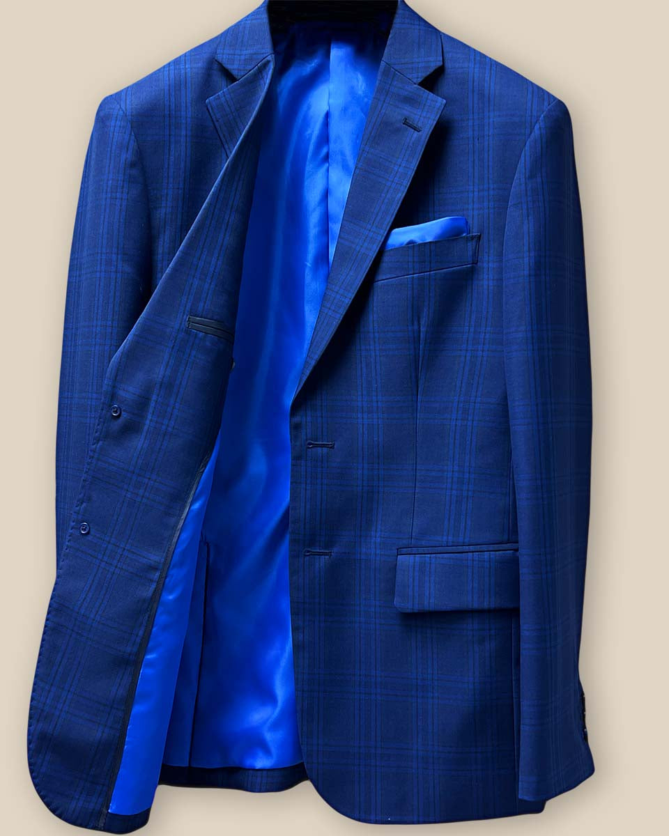 Interior right side of dark blue Westwood Hart suit jacket, showing lining details and inner pocket
